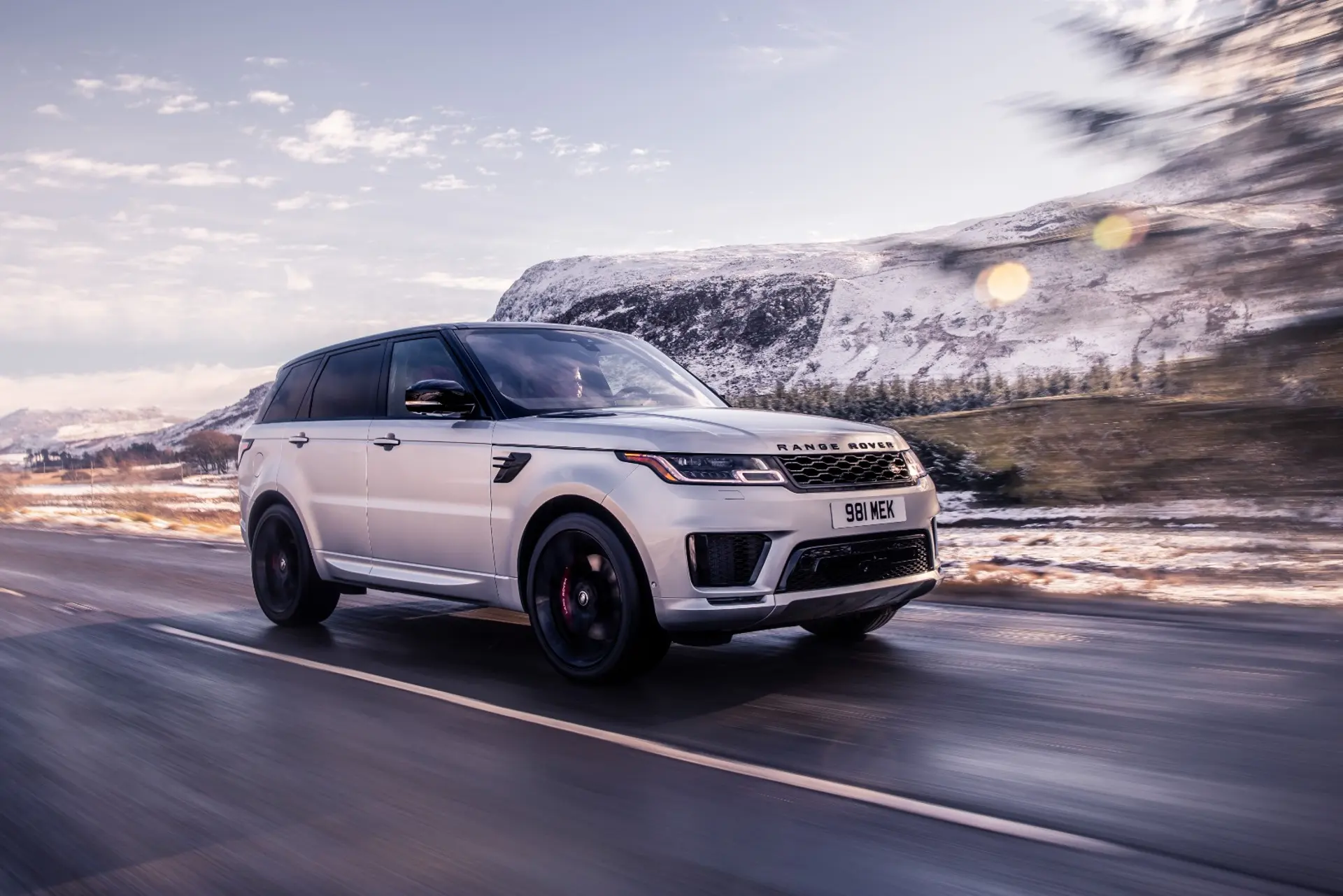 Range Rover Sport HST driving on the road 