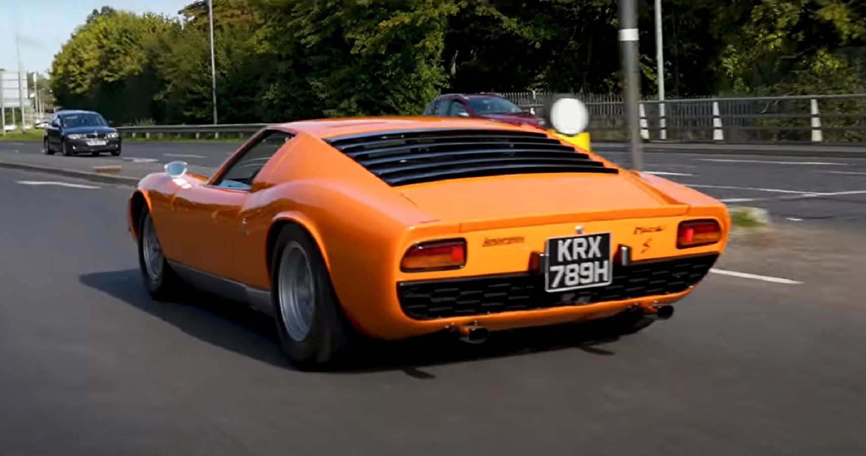 Richard Rawlings In An Orange Lamborghini Miura