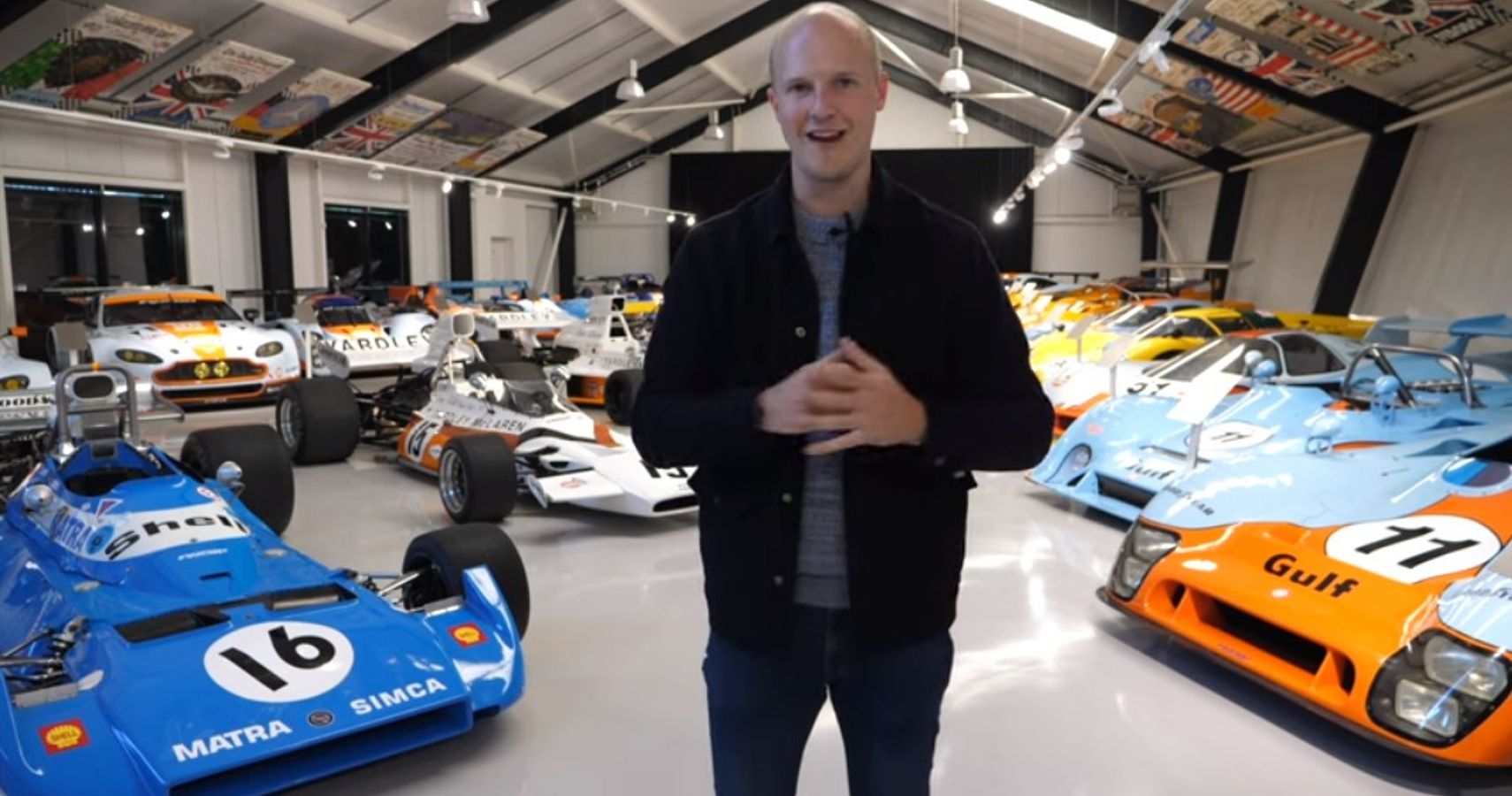 Seen Through Glass YouTube Channel 1989 Jaguar Sam standing in ROFGO with Gulf race cars