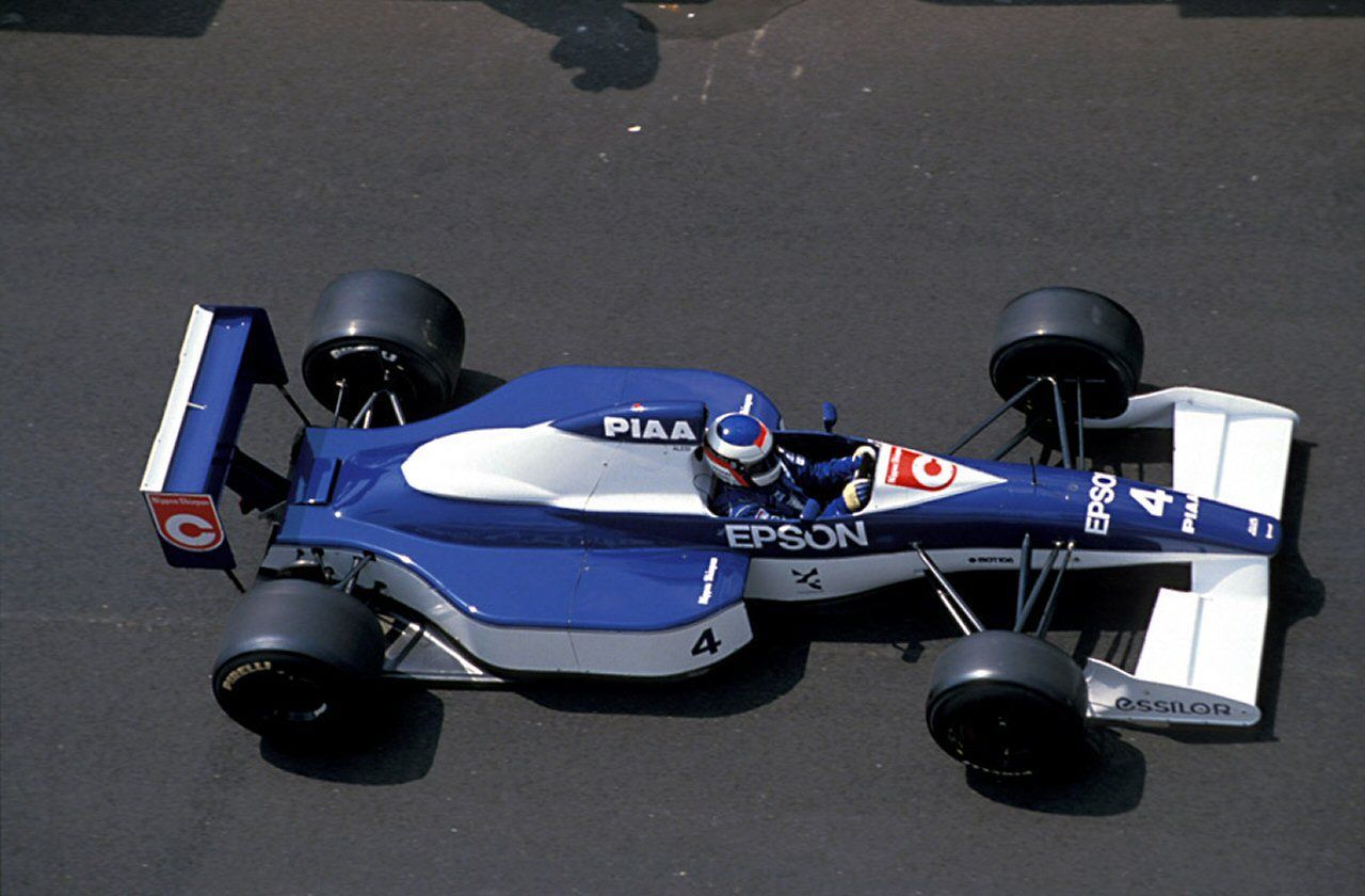 Blue Tyrrell 019 on track
