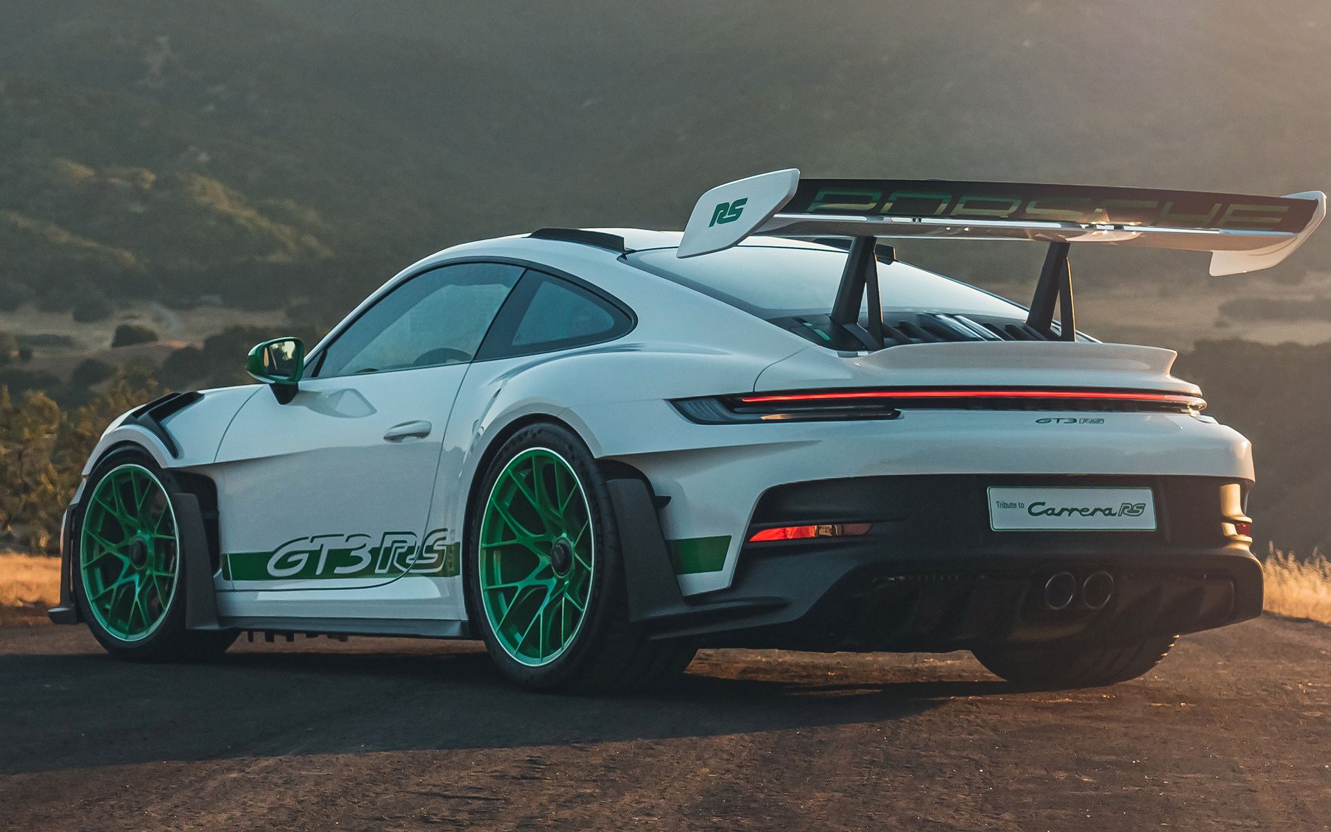 The 2022 Porsche 911 GT3 RS pays tribute to the Carrera RS package - rear quarter view outside