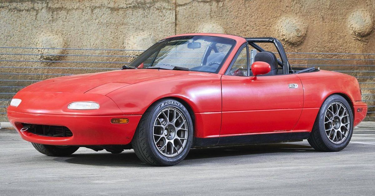 Red 1992 Mazda MX-5 Miata Parked