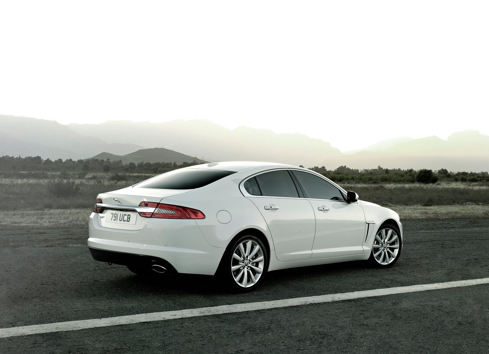2012 Jaguar XF White Side Profile Rear