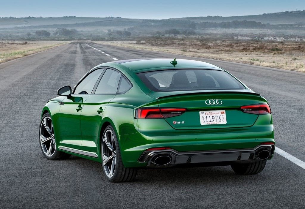 Green 2019 Audi RS5 Sportback on the road