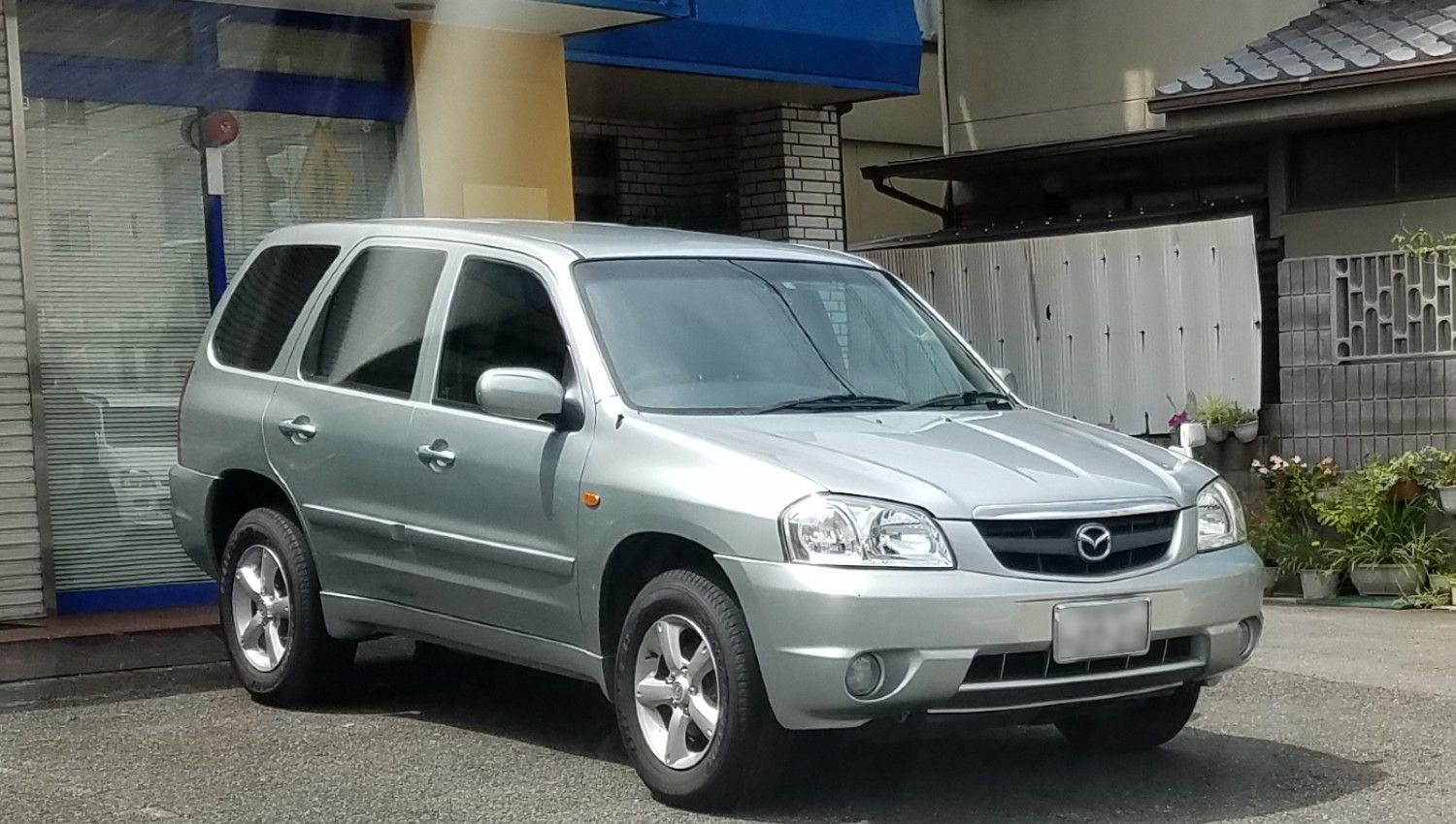 mazda tribute 3 л