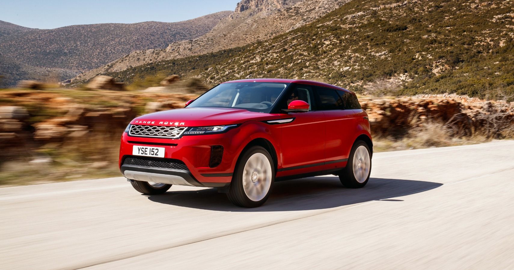 Red Range Rover Evoque driving