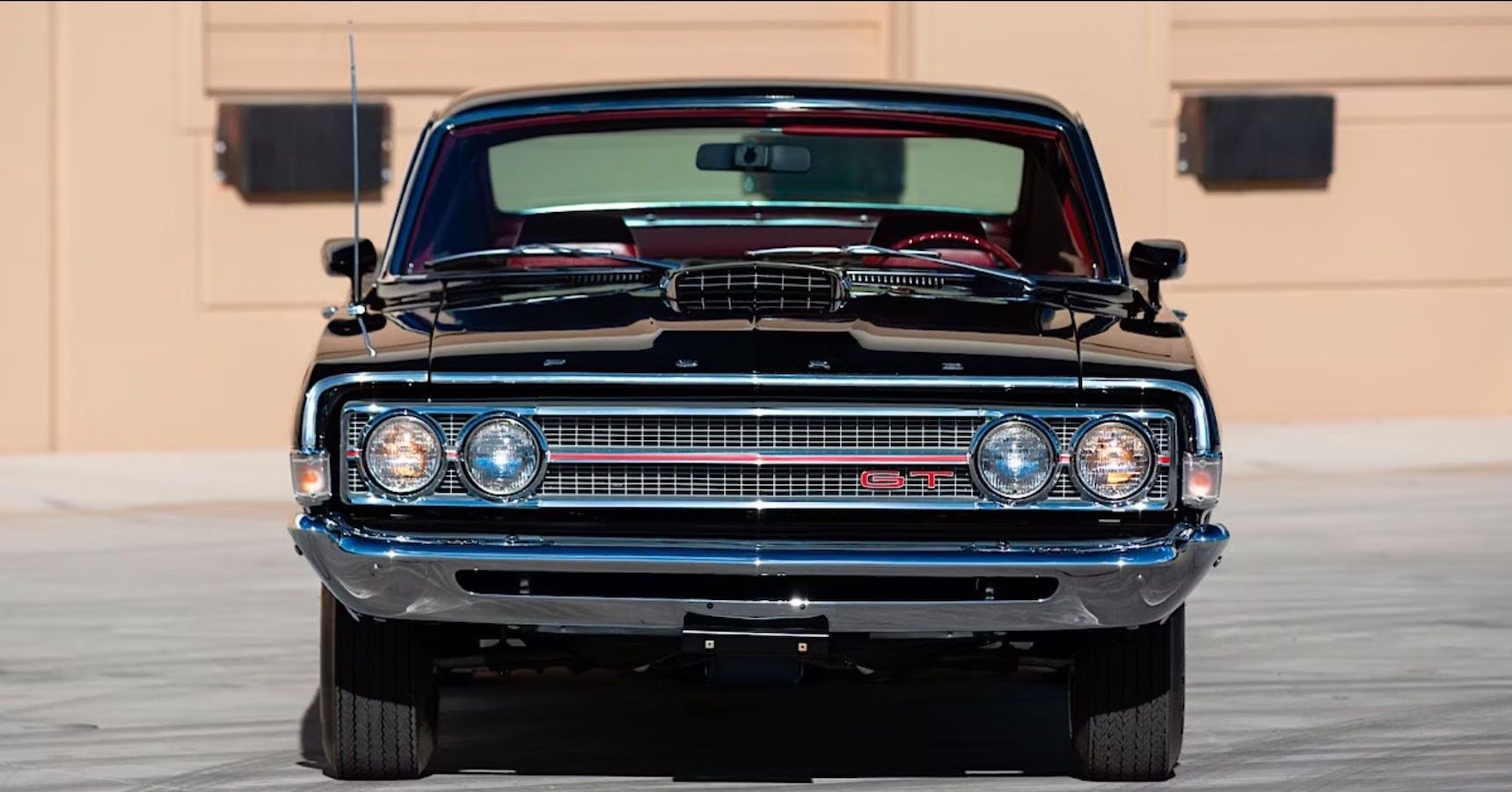 Black 1969 Ford Torino GT parked