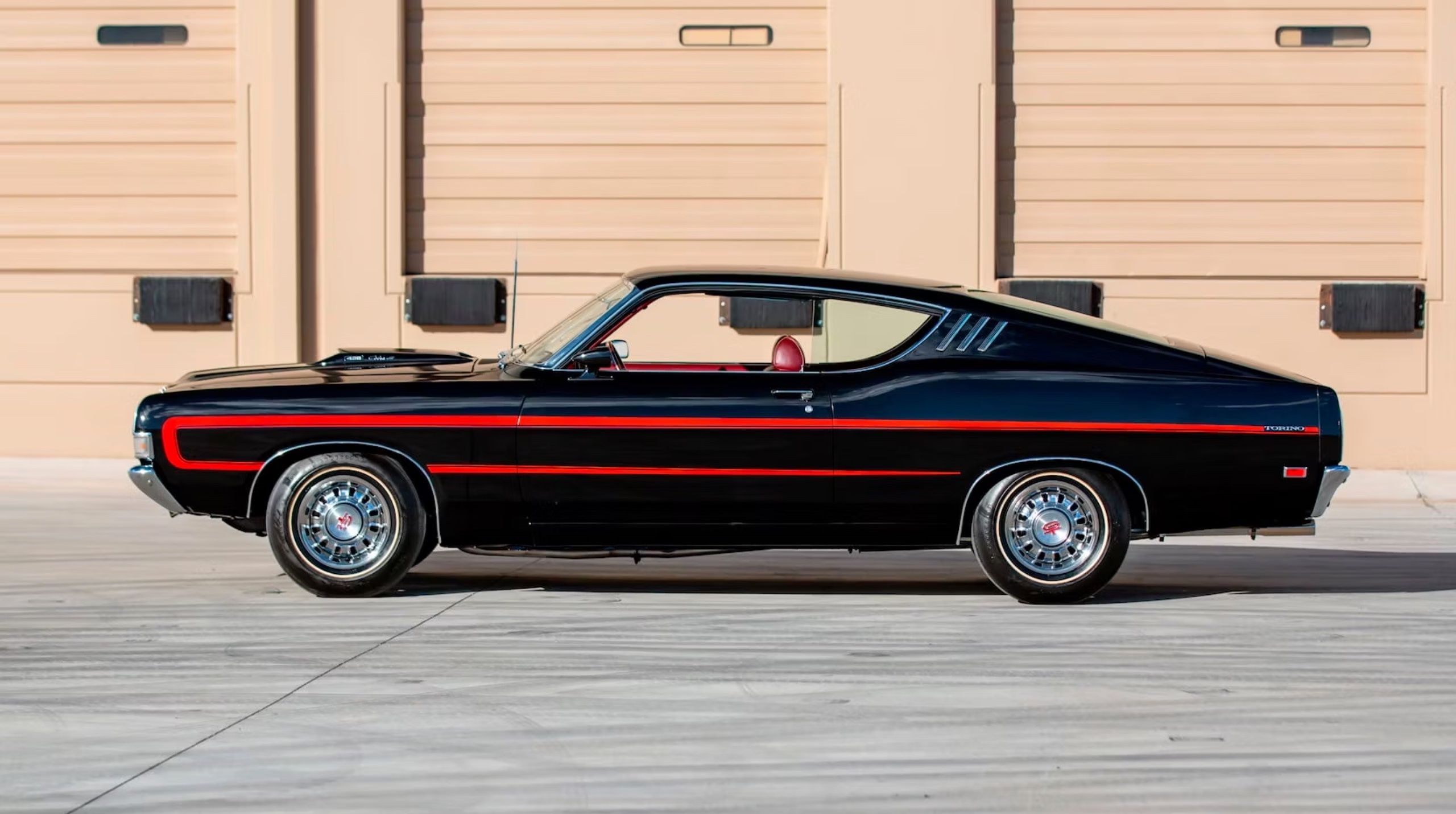 Black 1969 Ford Torino GT parked
