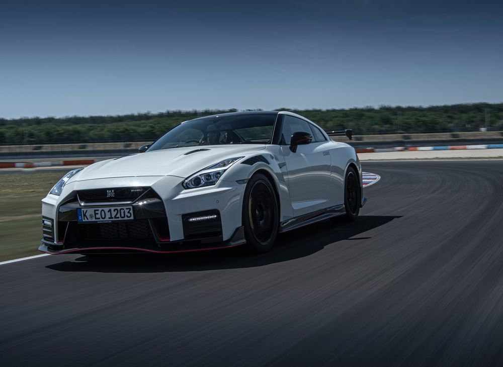 White 2022 Nissan GT-R Nismo driving 