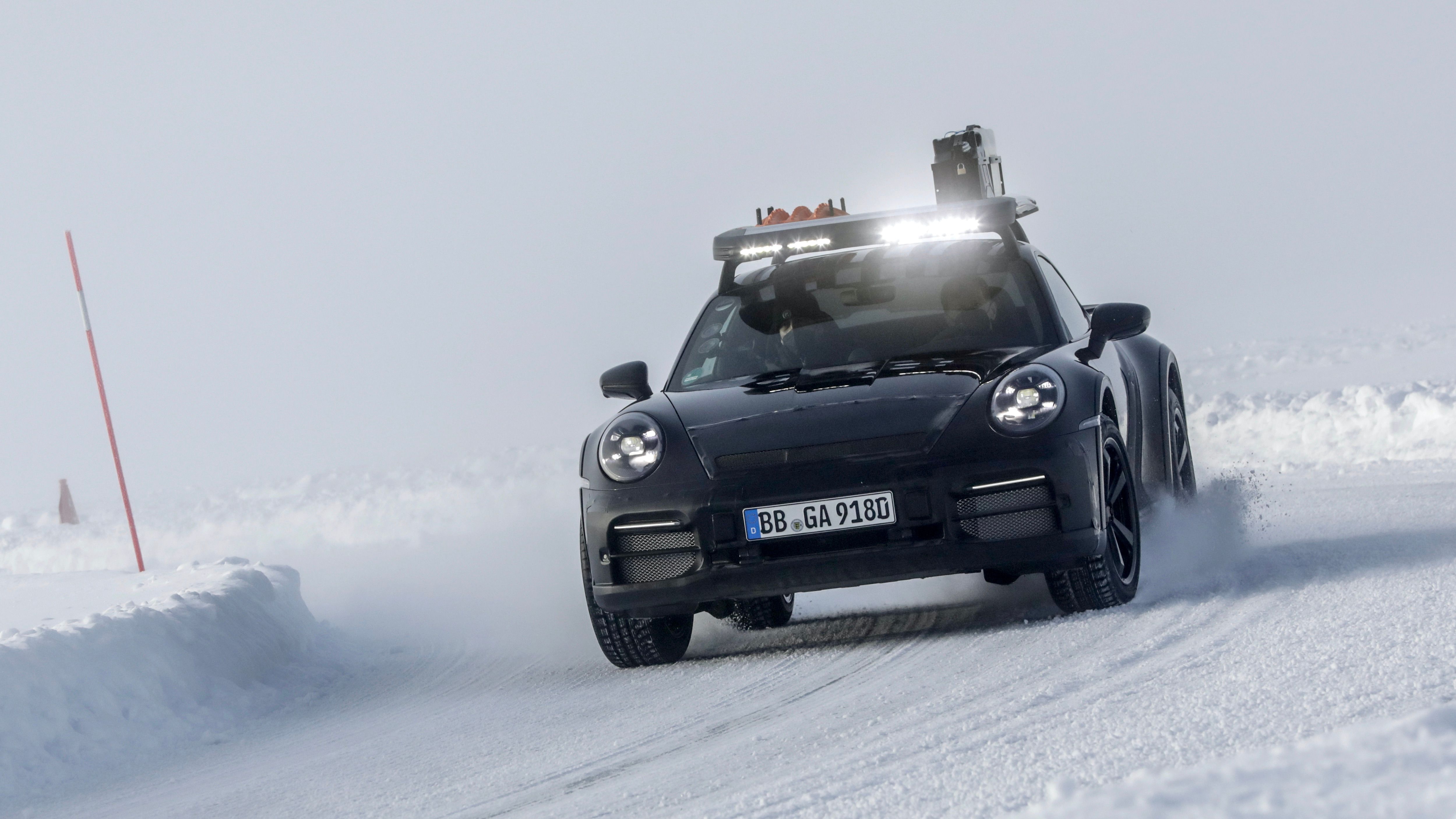 Black 2023 Porsche 911 Dakar Drifting On Ice