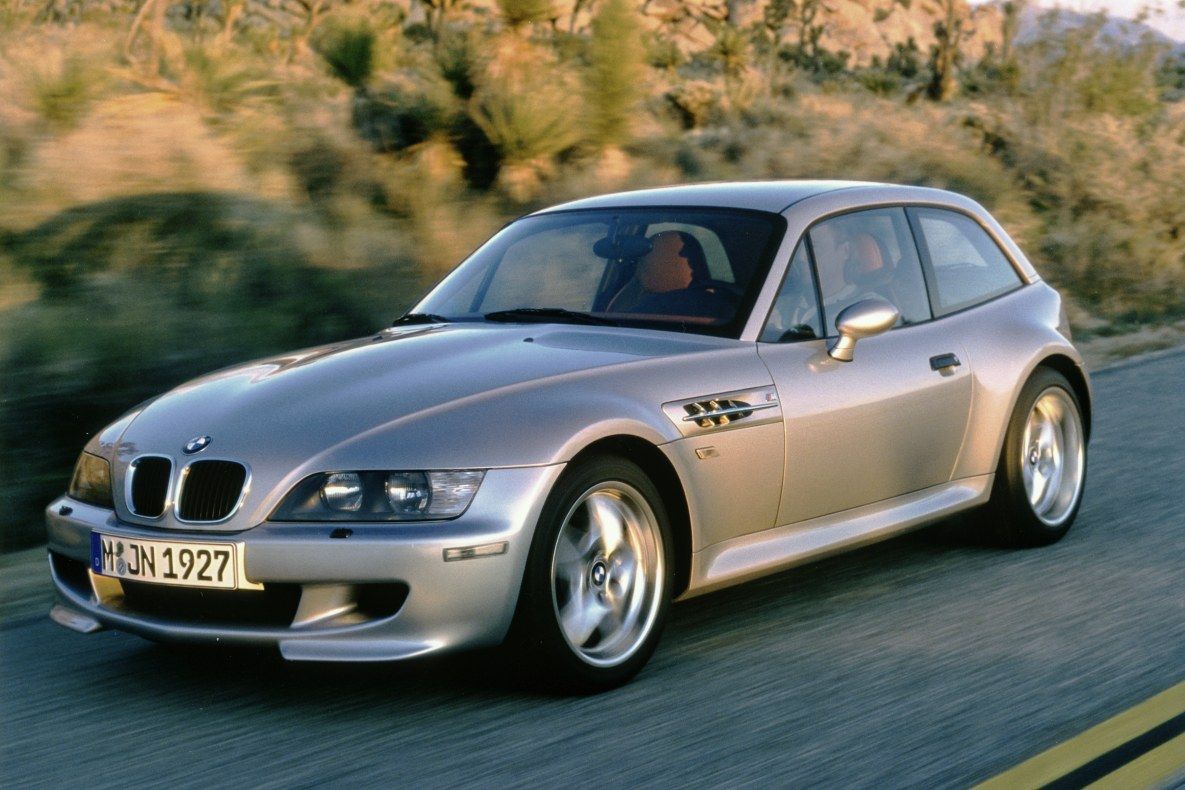 BMW Z3 M Coupe in silver driving near hills