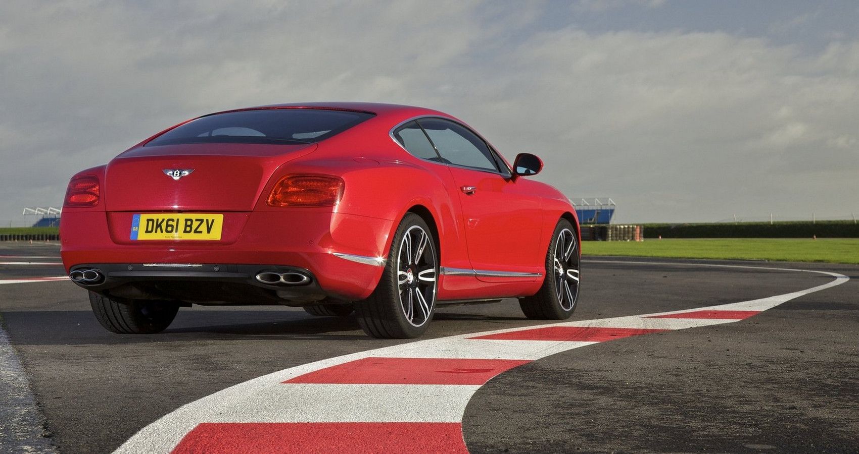 Red Bentley Continental GT on track