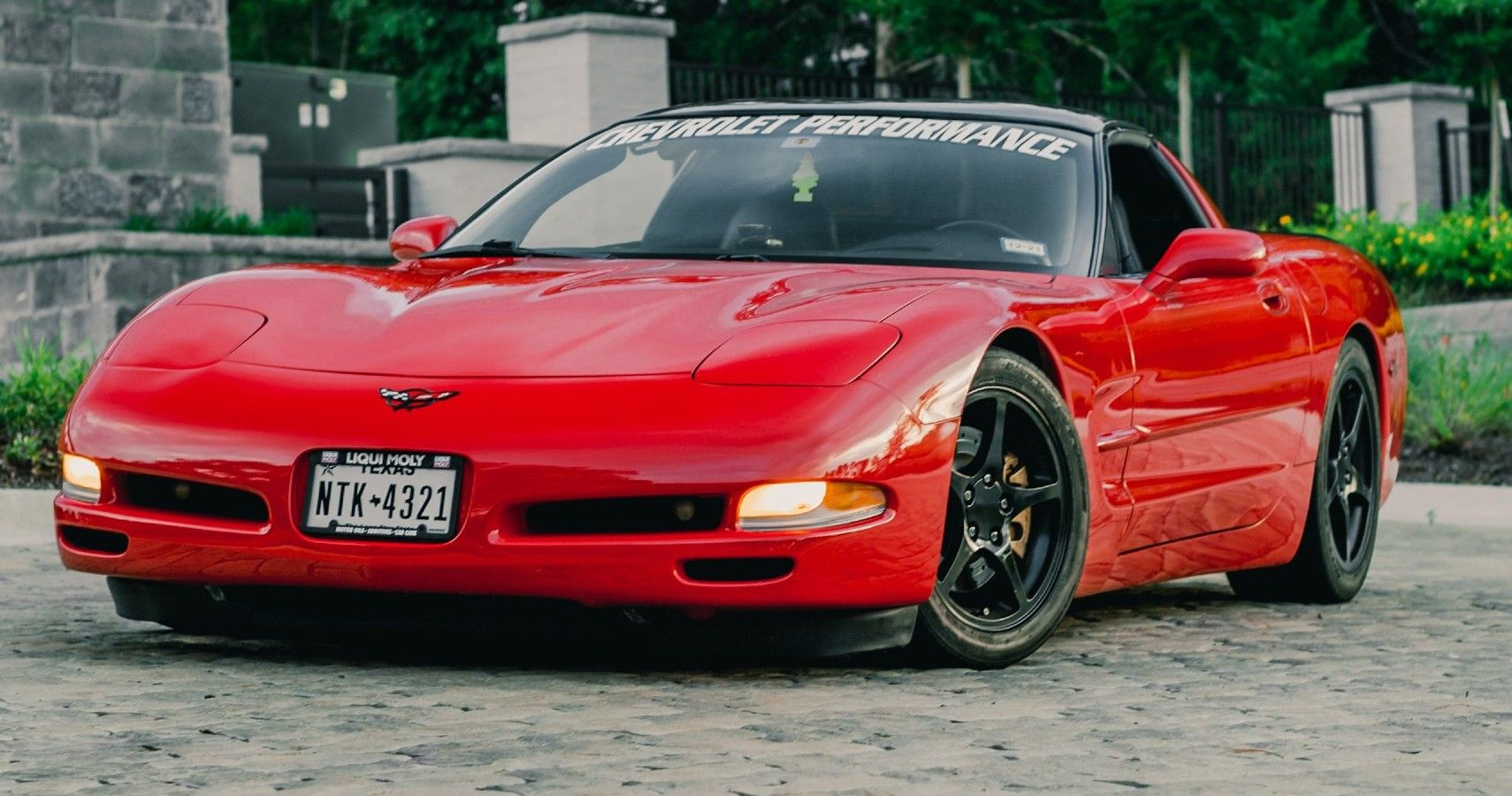 Red C5 Corvette Parked Front 3/4