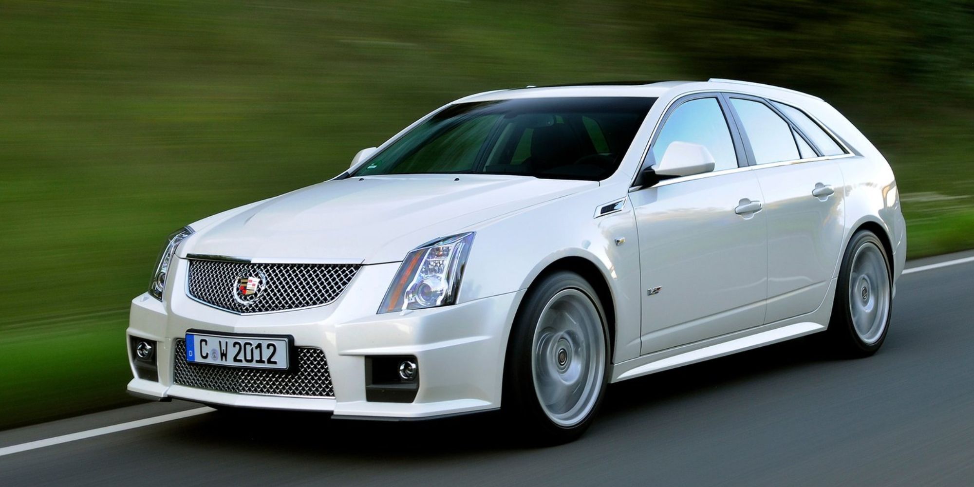 Cadillac CTS-V wagon front quarter white diamond tricoat running