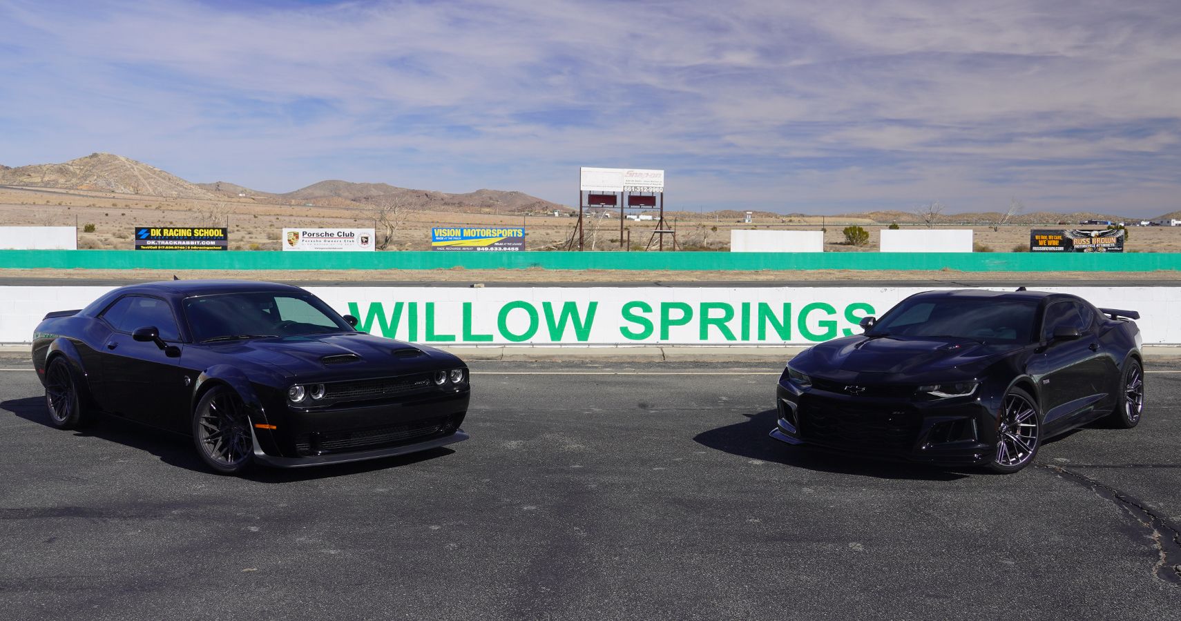 Dodge Challenger Hellcat Versus Chevrolet Camaro ZL1 Willow Springs for three quarters