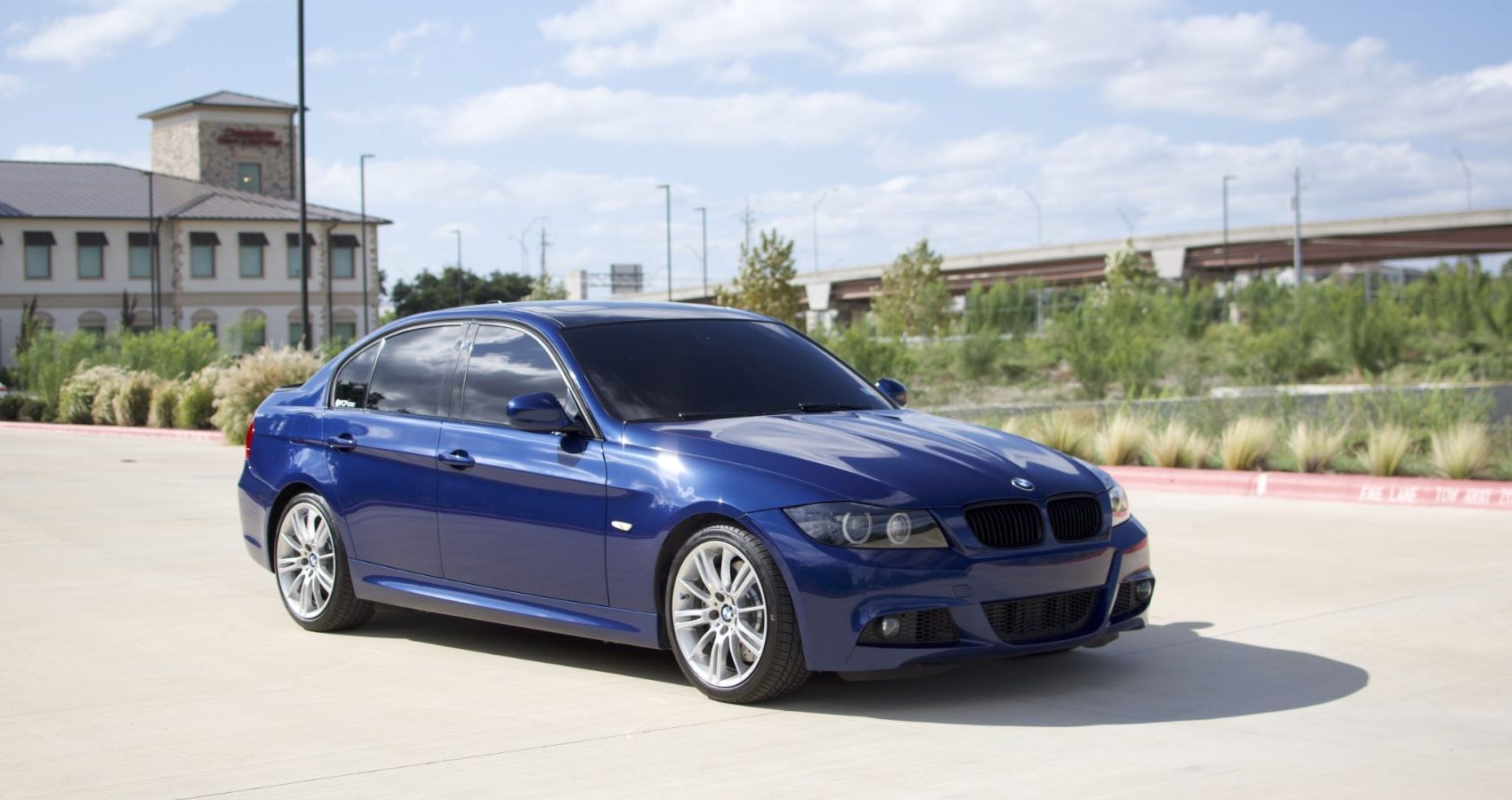 E90 BMW 335i blue performance sedan 