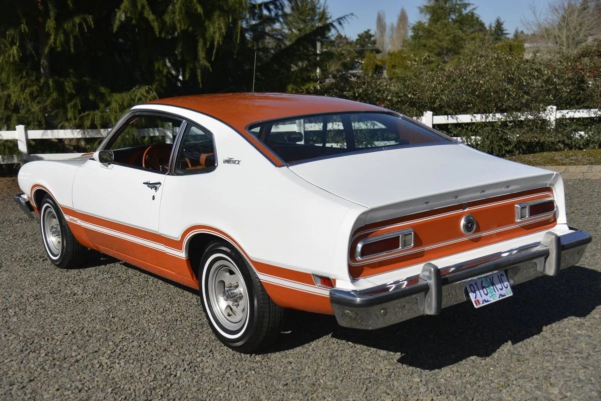 White and brown 1971 Ford Maverick Grabber Parked