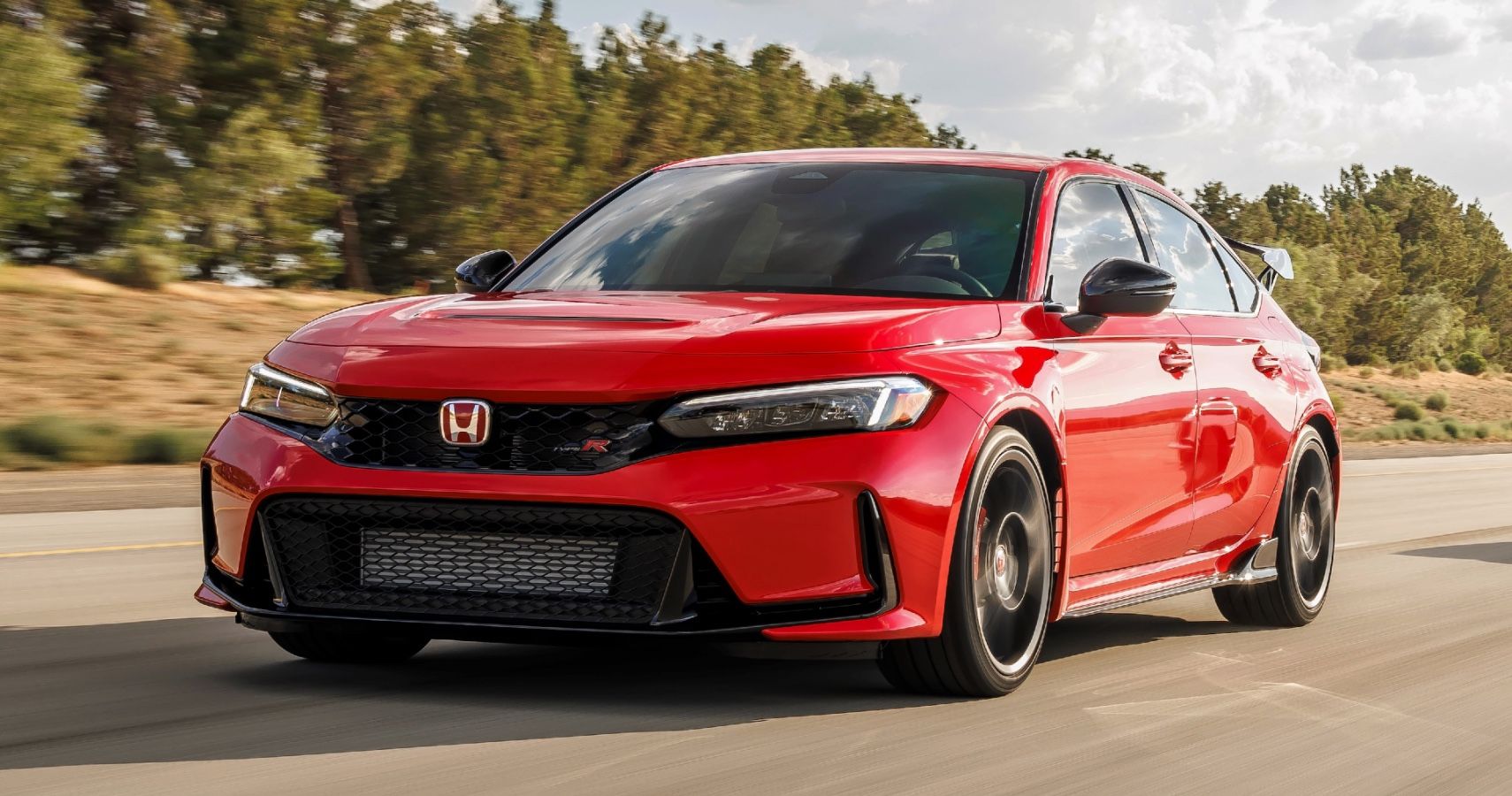 red 2023 honda civic type r driving