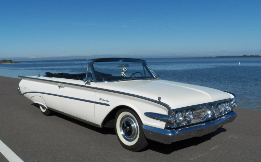 ford edsel ranger convertible parked near the water