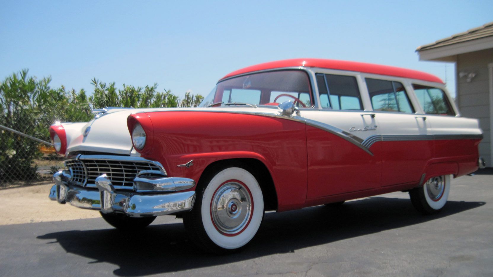Red 1959 Ford Country Sedan Wagon parked