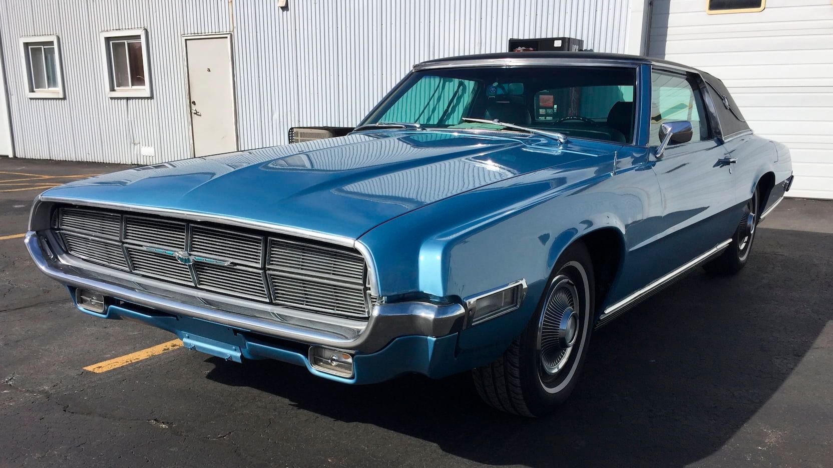 Blue 1969 Ford Thunderbird on the parking lot