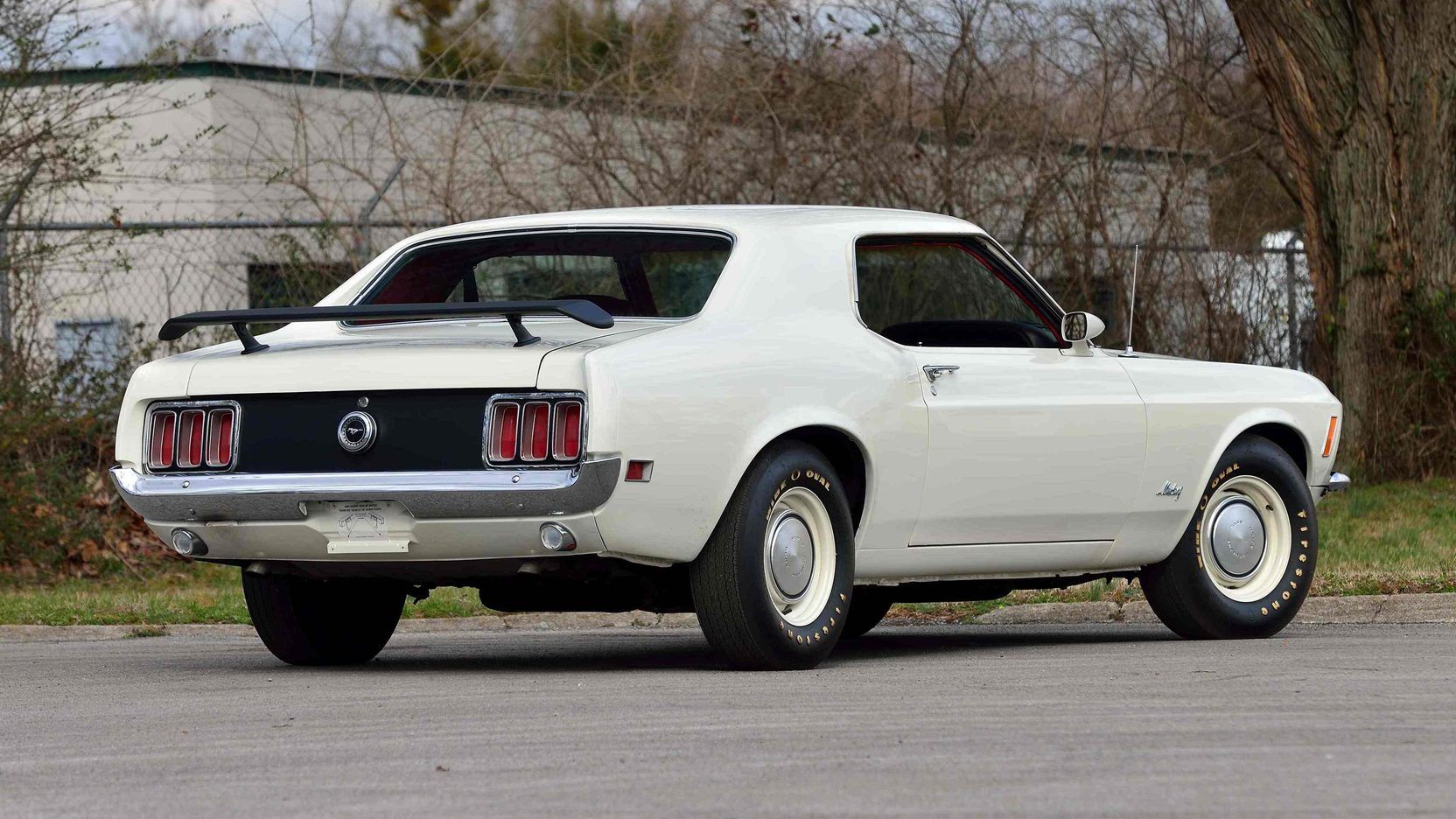 White 1970 Ford Mustang Coupe on the road