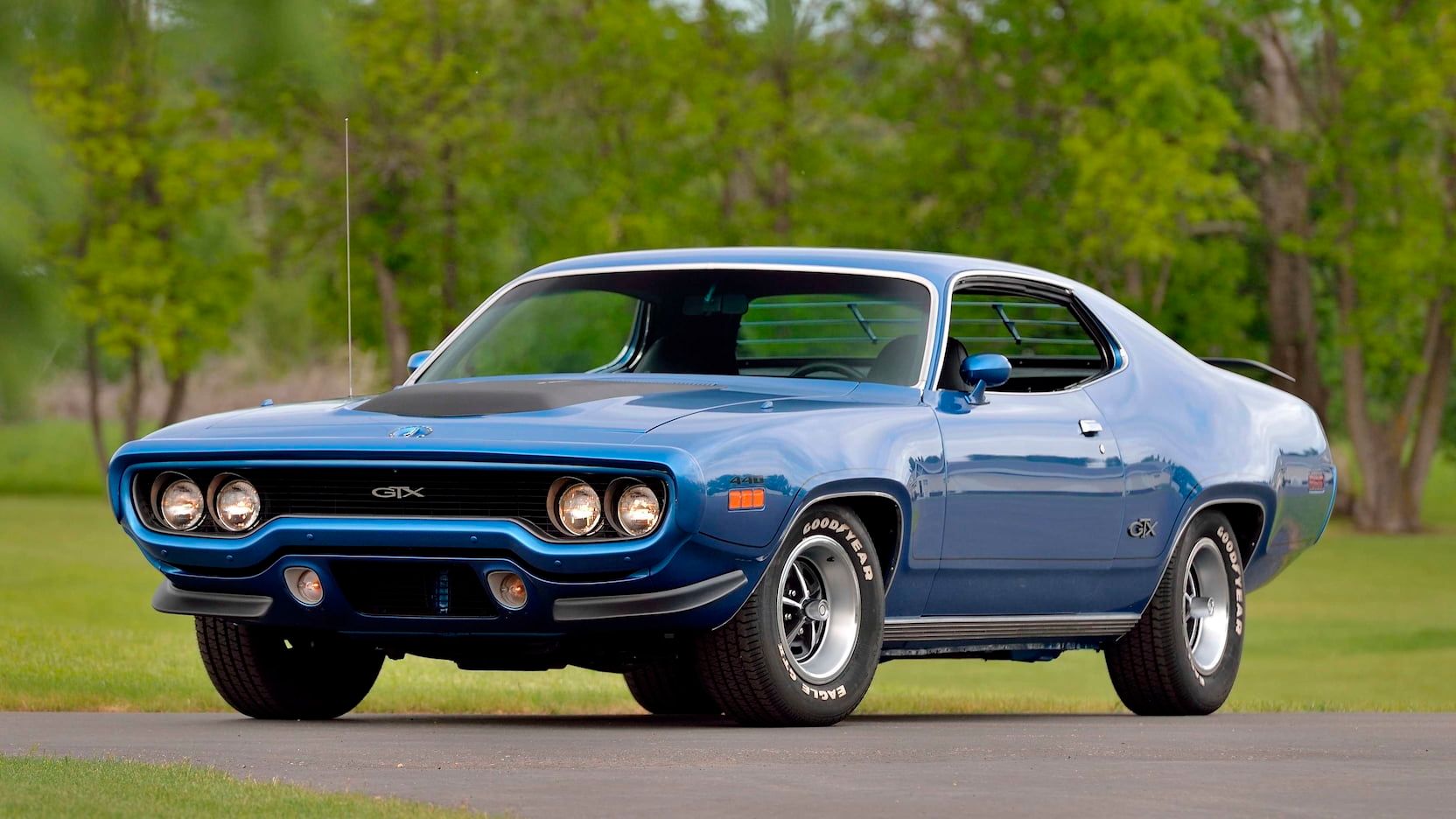 Blue 1971 Plymouth GTX on the road