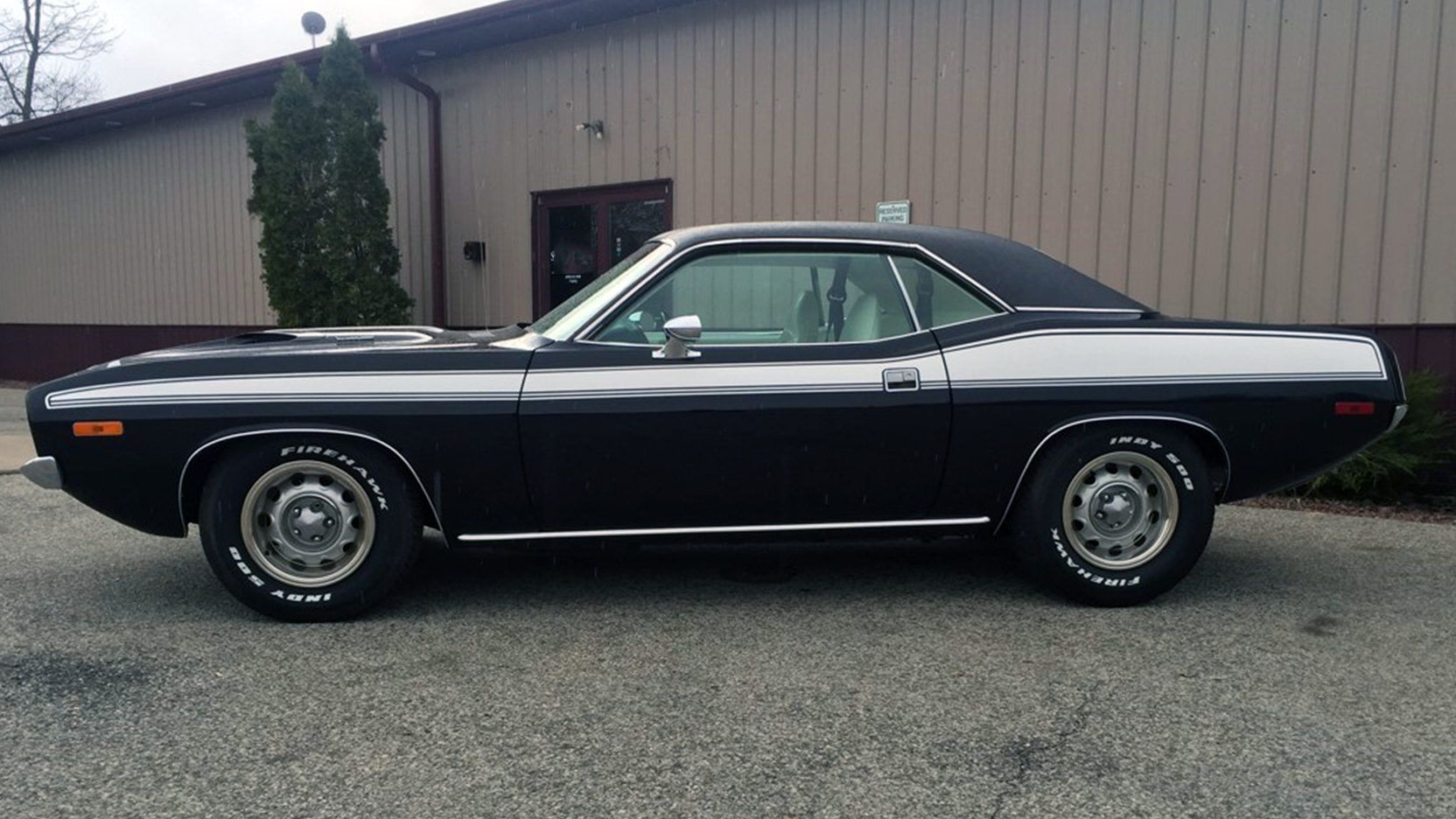 Black 1974 Plymouth Cuda Parked