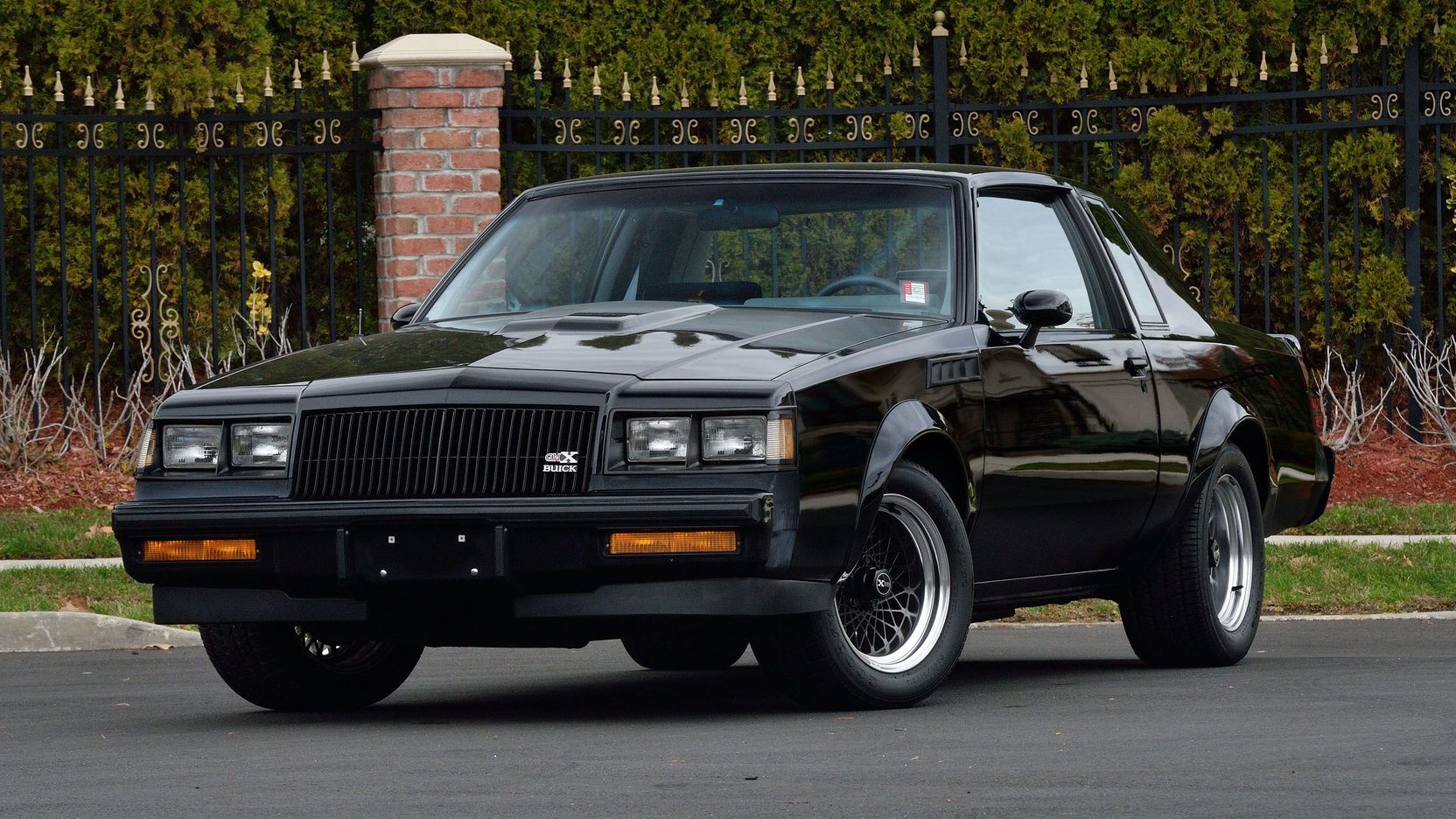Black 1987 Buick Regal GNX on the road