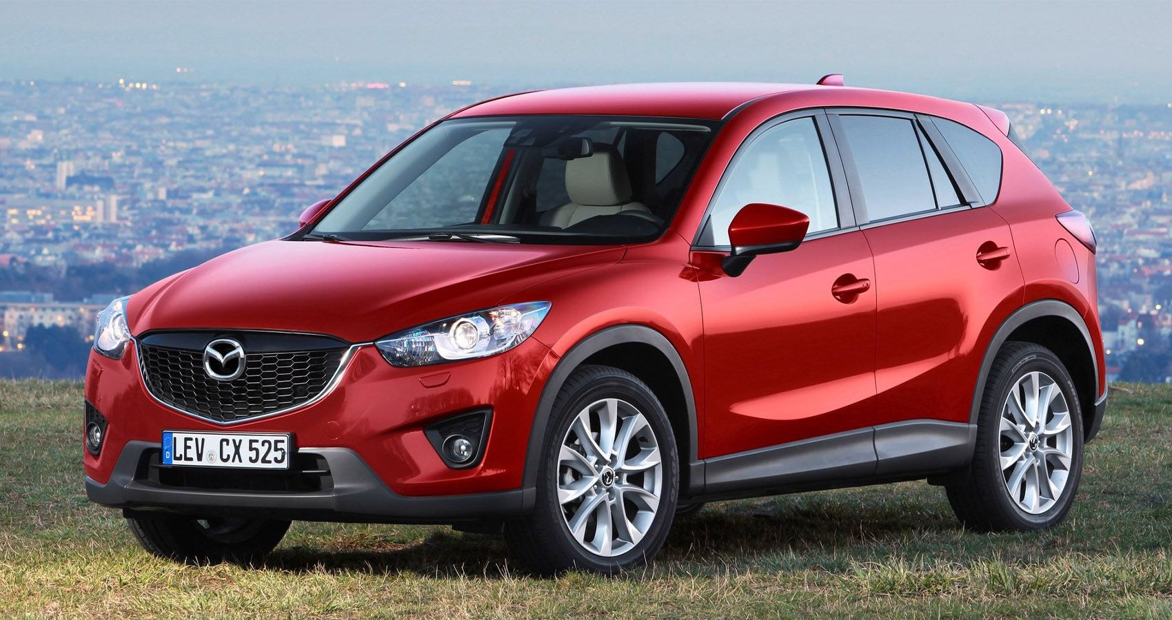 Red 2013 Mazda CX-5 parked