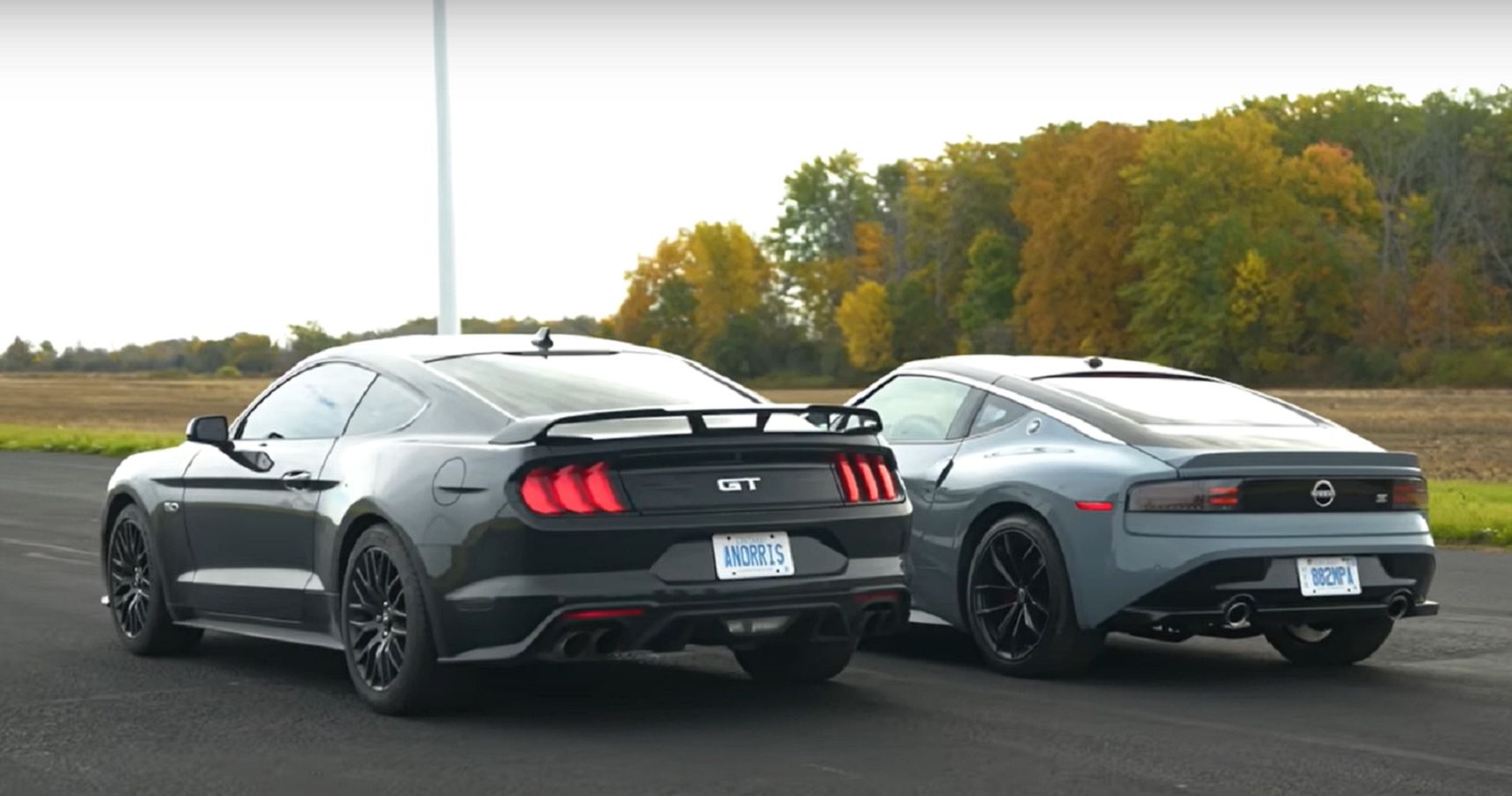 The New Nissan Z Tries To Keep Up With A New Ford Mustang GT