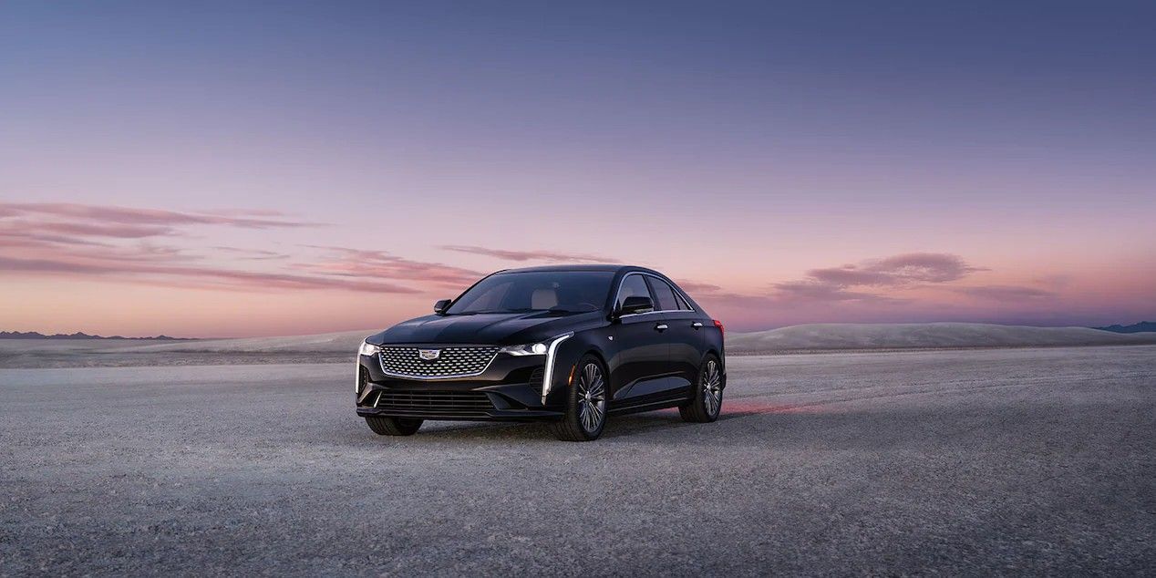 Black 2023 Cadillac CT4 on the road