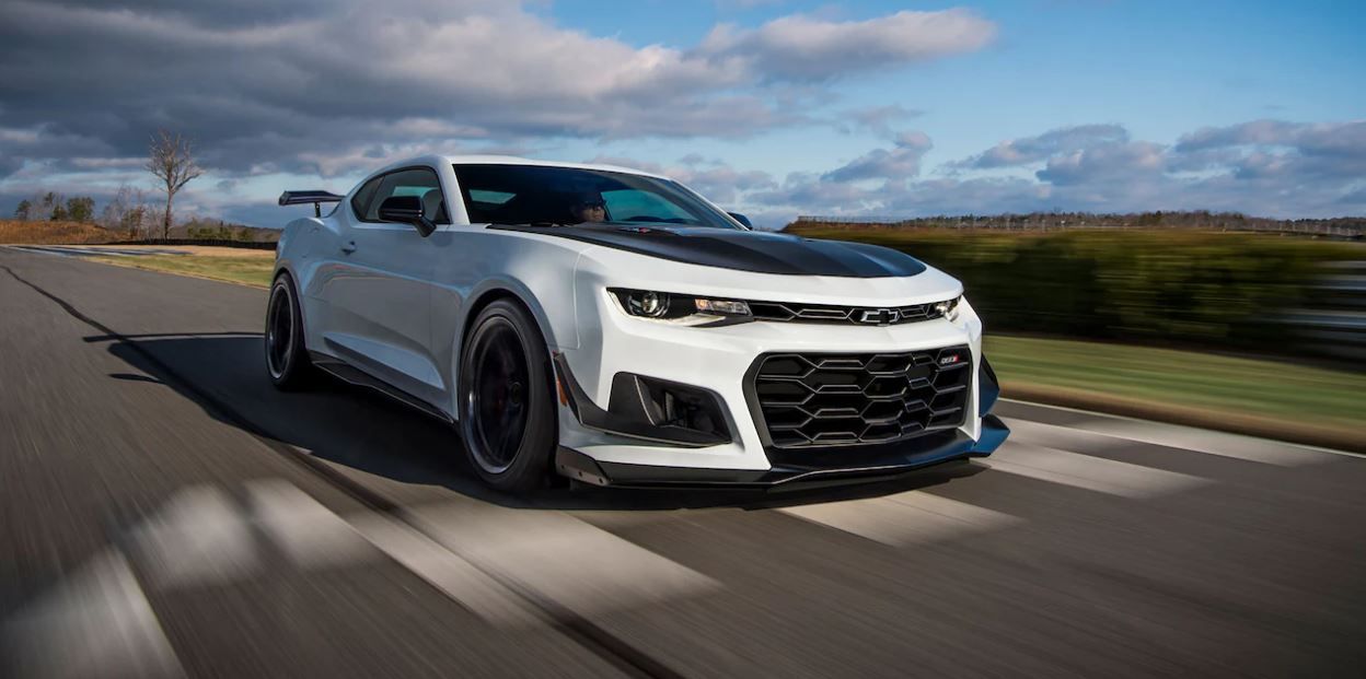 2023 Chevrolet Camaro ZL1 accelerating furiously on the road front third quarter view