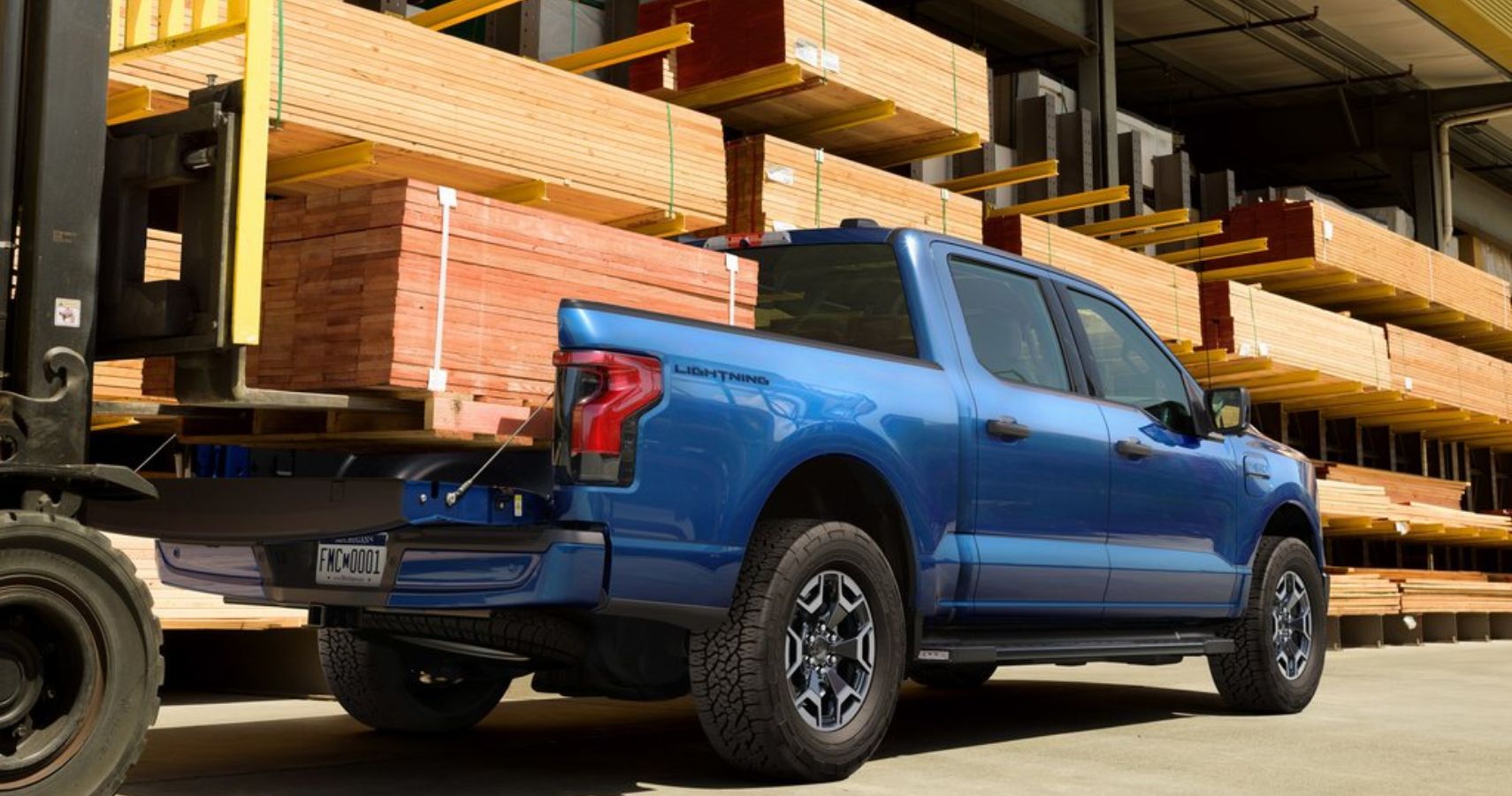 2023-ford-f-150-lightning-exterior-rear-angle-work