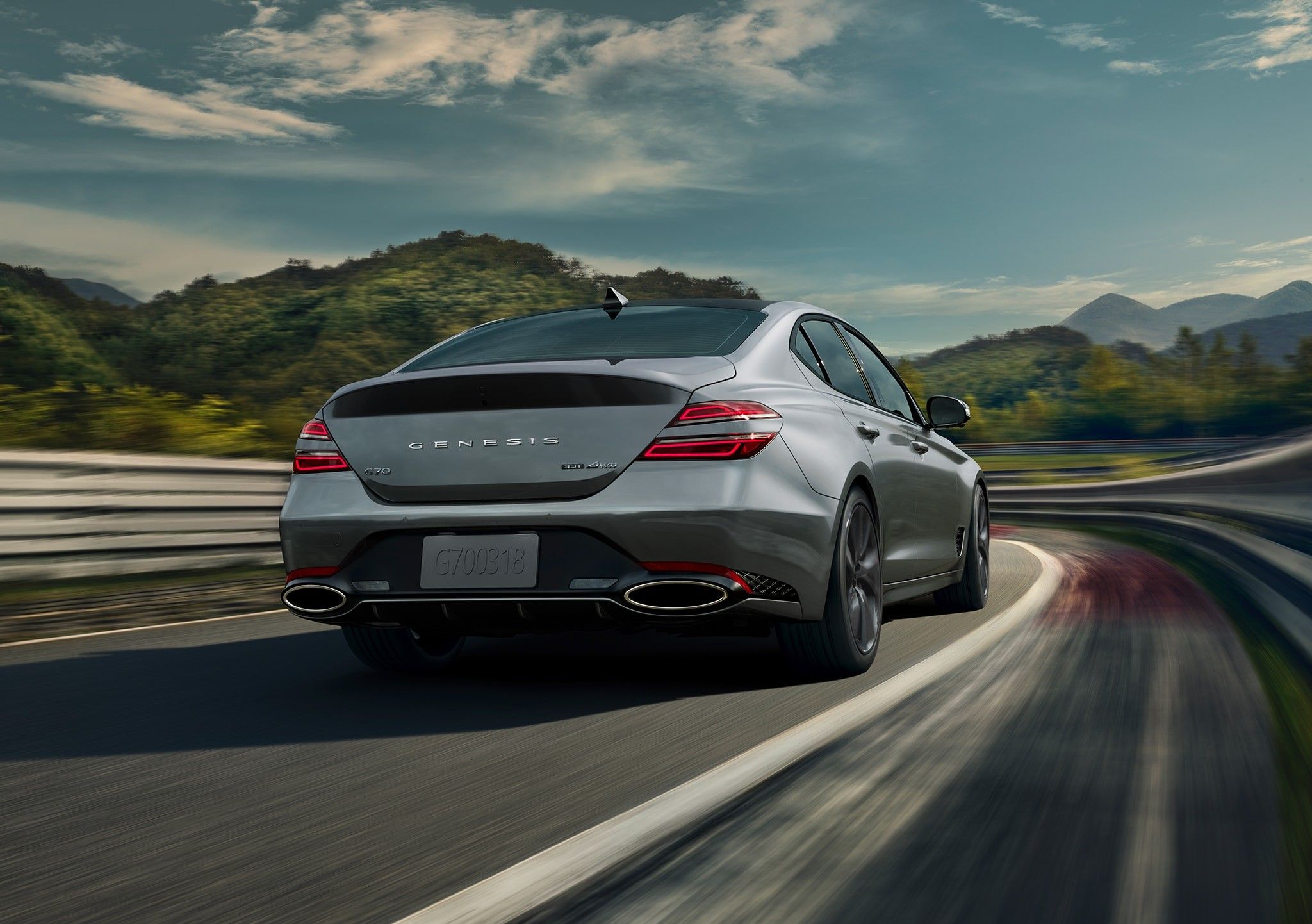 Gray 2023 Genesis G70 on the road