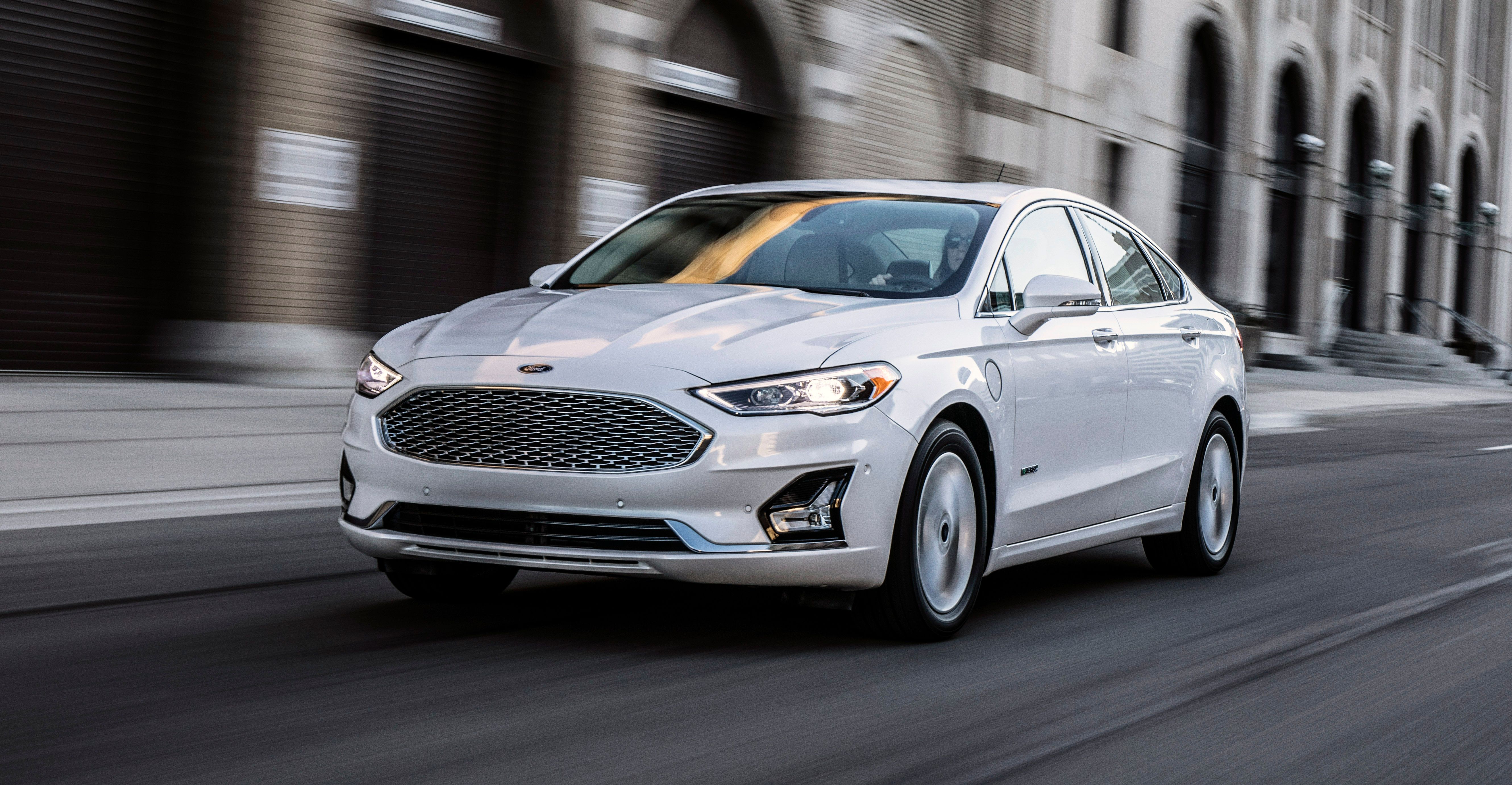 White 2020 Ford Fusion on the road