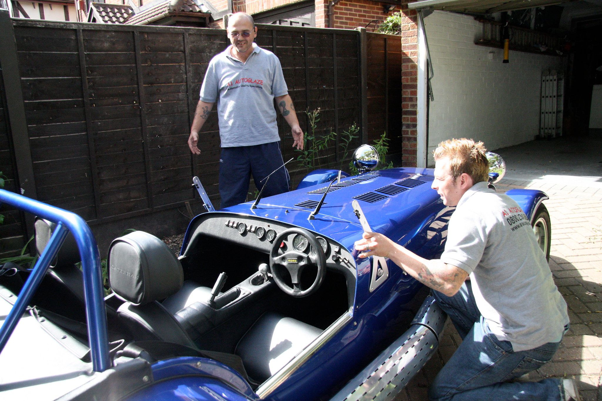 Caterham and two people