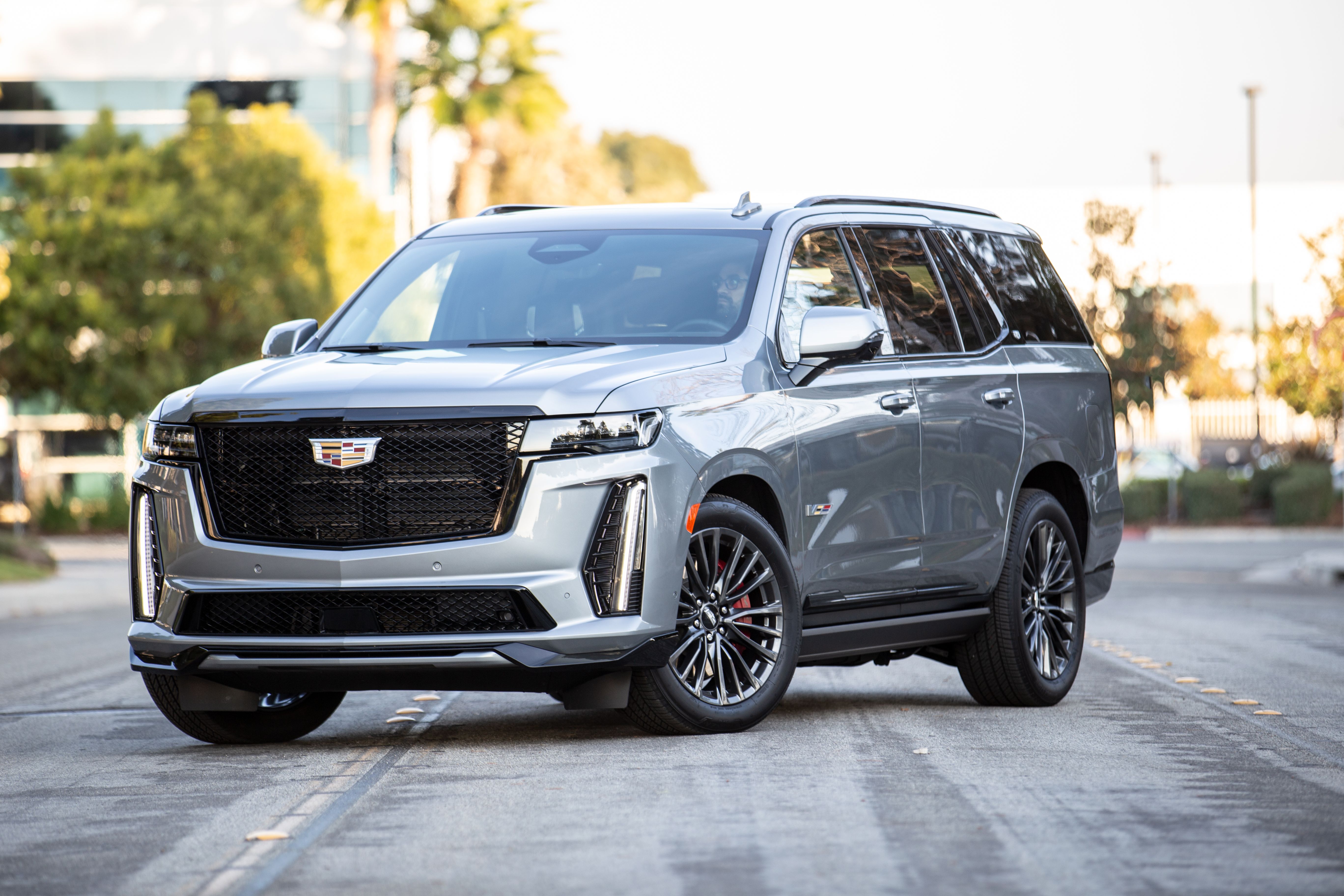 Silver 2023 Cadillac Escalade-V on the road