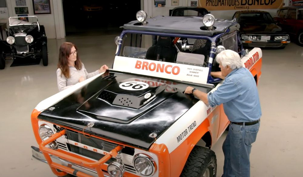 Amy Lerner and Jay Leno with Rod Hall's 1968 Ford Bronco