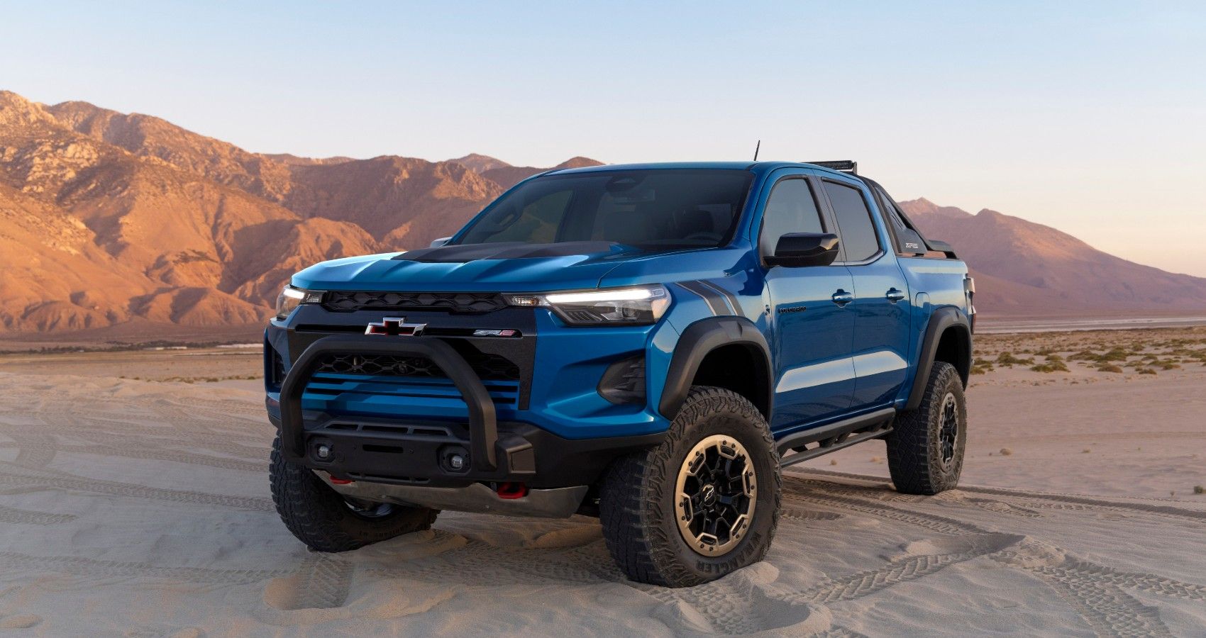 blue Chevrolet ZR2 Desert Boss in a desert background
