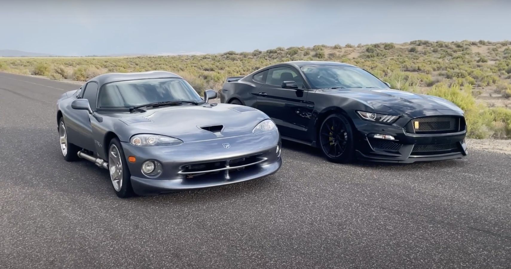 Dark gray Dodge Viper with black Ford Mustang Shelby GT350
