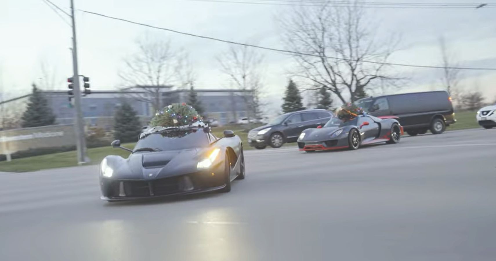 The Hamilton Collection Hypercars driving with Christmas trees on roof