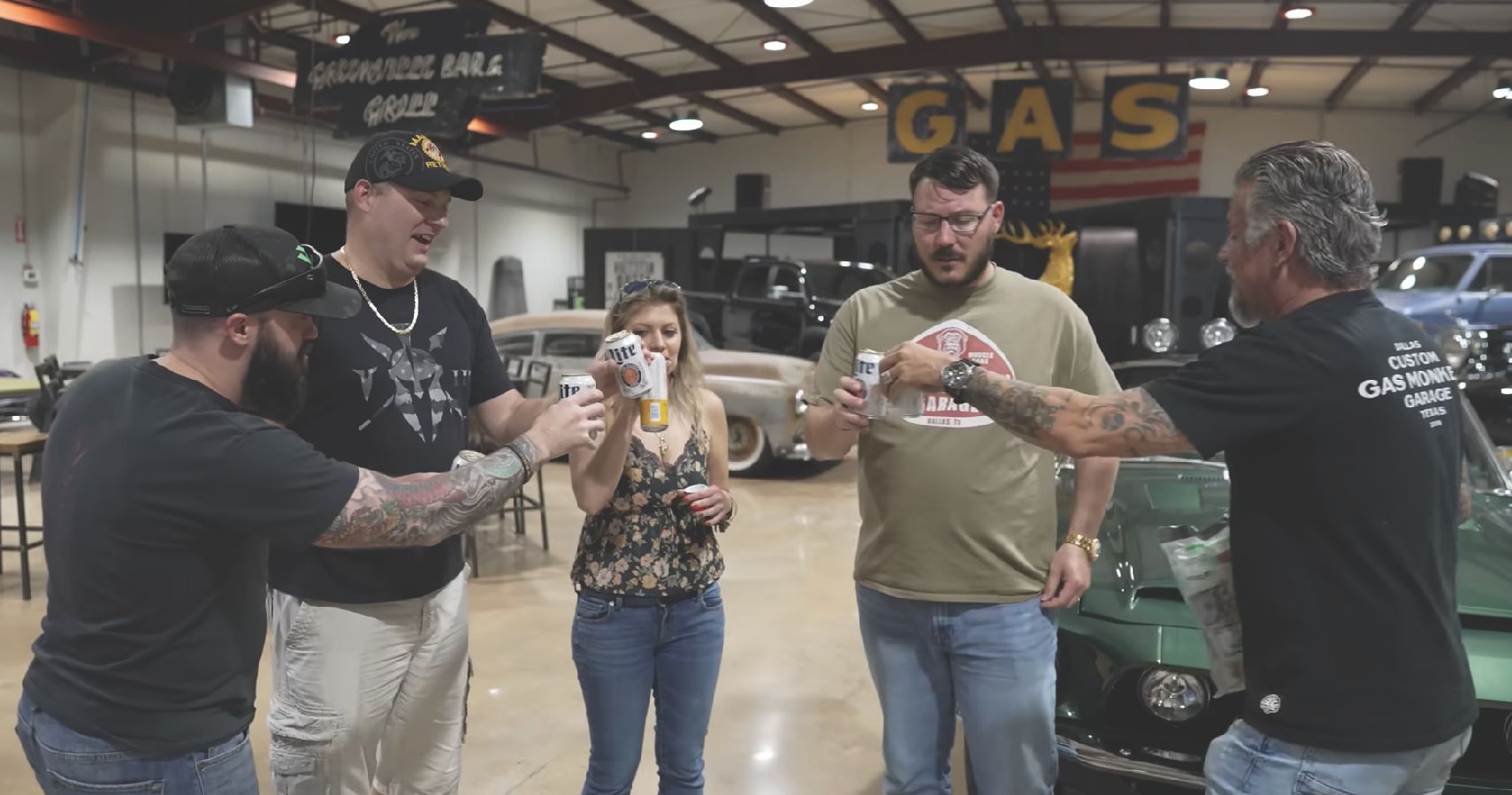 Gas Monkey Garage Party With Richard Rawlings and people in garage