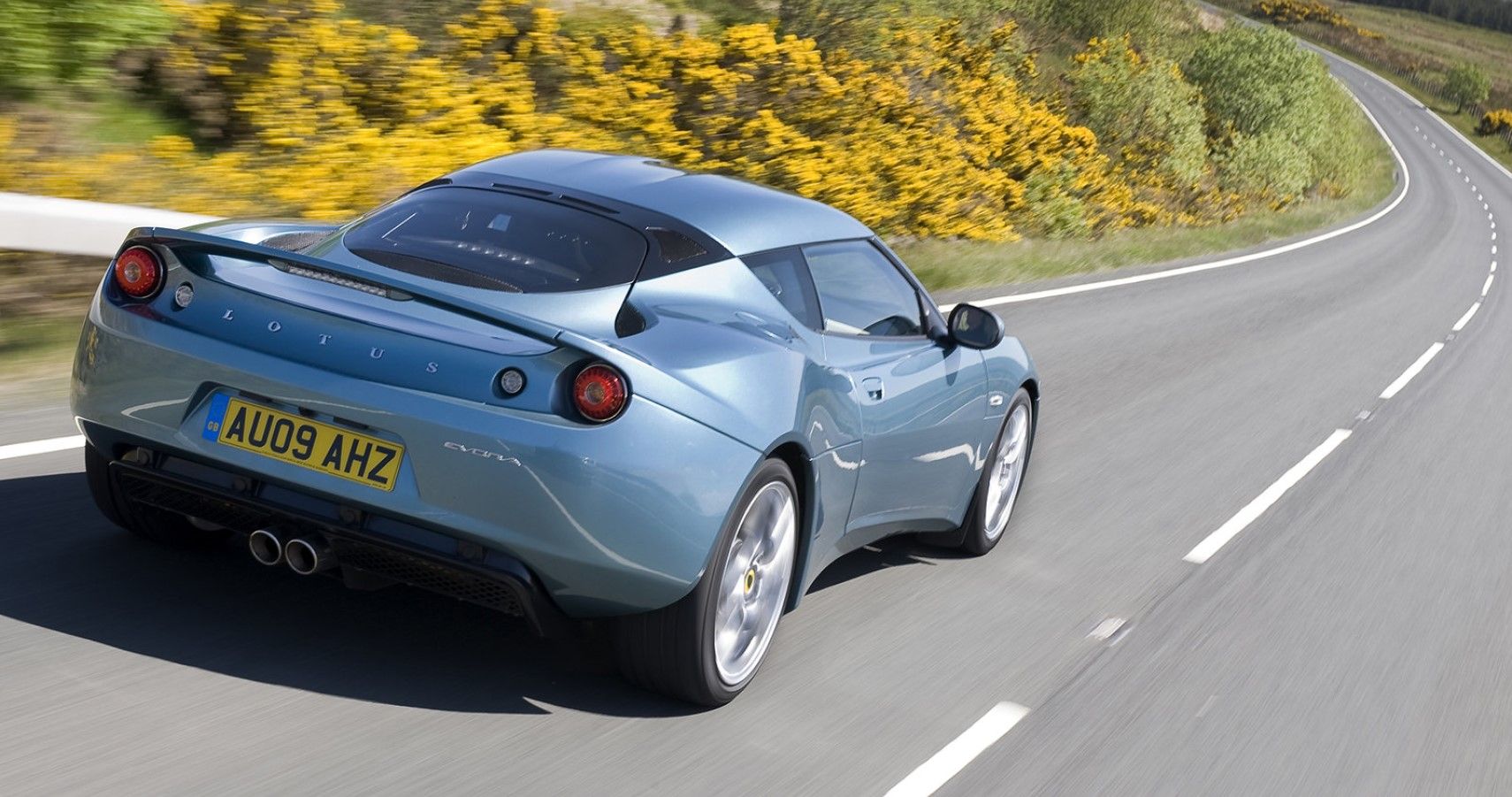 2010 Lotus Evora accelerating on the highway