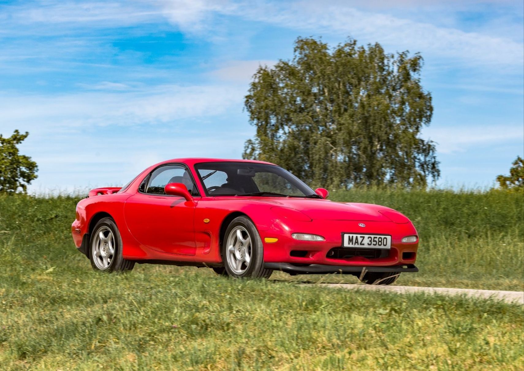 Mazda RX-7 FD Front Quarter View Red Driving