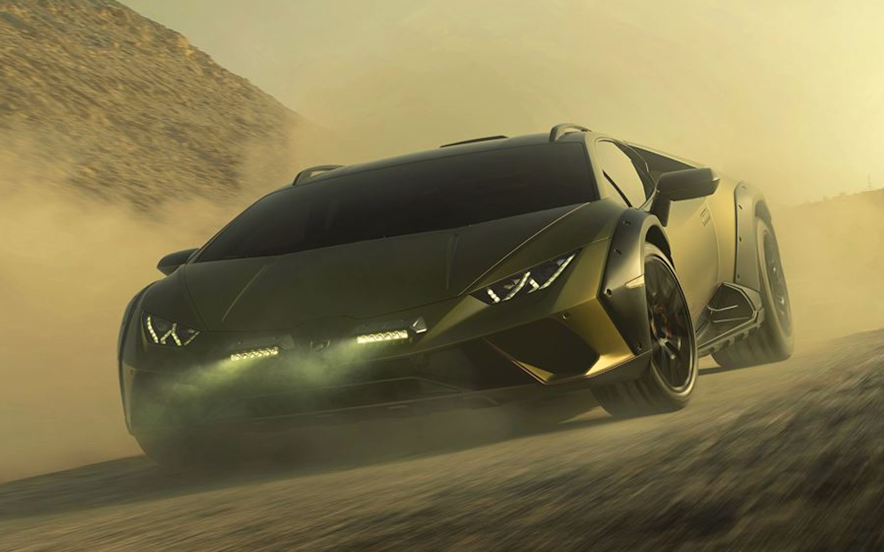 Green 2023 Lamborghini Huracan Sterrato Charging Through Dust
