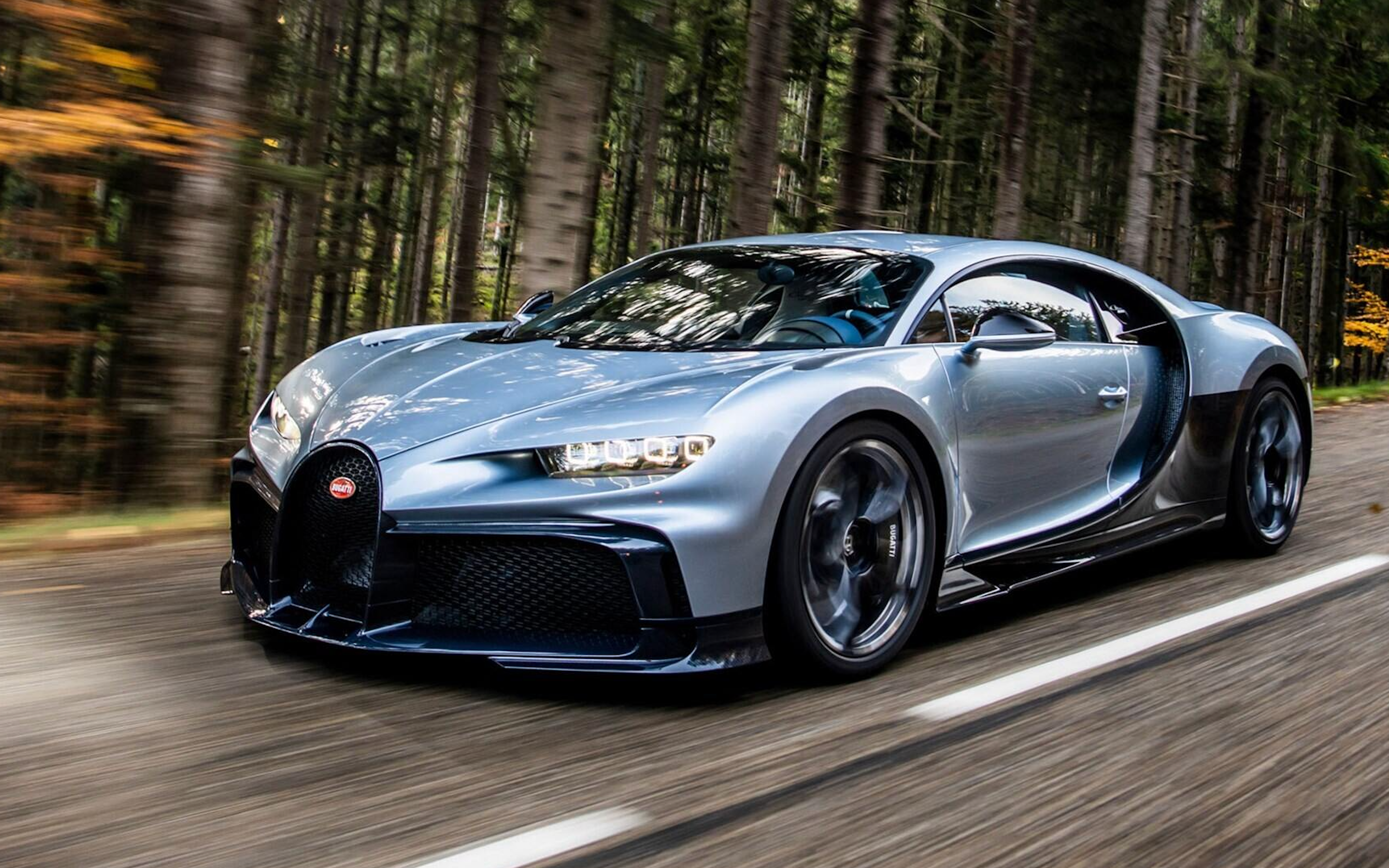 Blue 2022 Bugatti Chiron Profilee Driving Through Forests