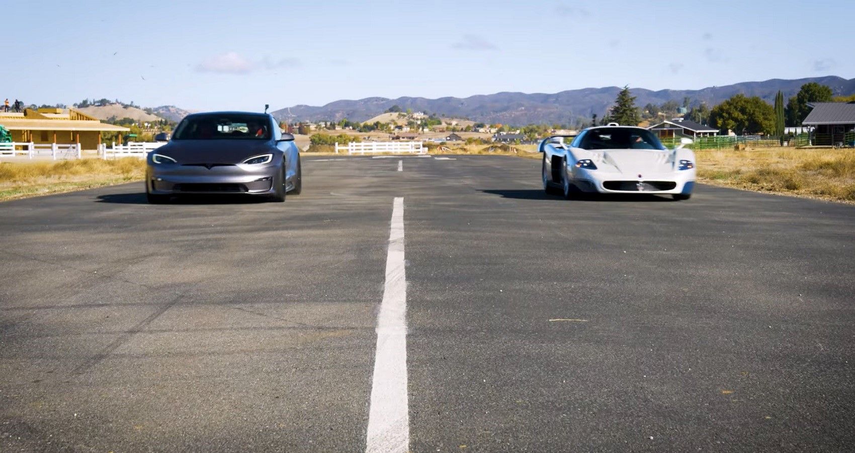 See What Happens When The Tesla Model S Goes Up Against Some Of The Fastest Legends Ever