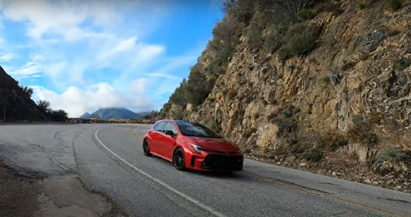 The new Toyota GR Corolla being tested for smoked tires in a California canyon