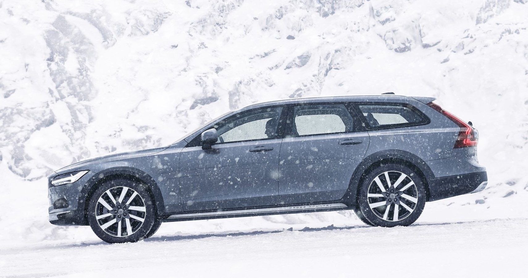 Silver Volvo V90 Cross Country on a snowy road